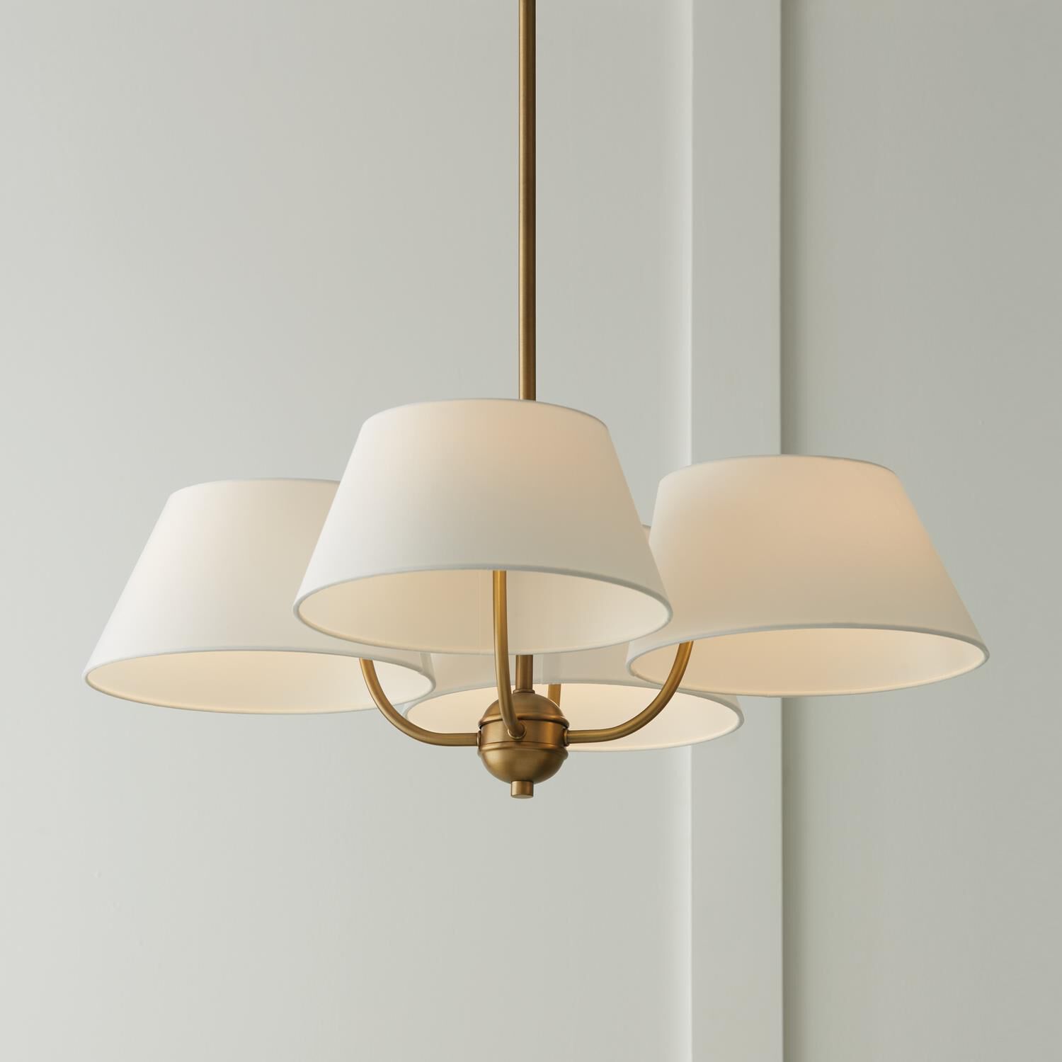 Shown in Aged Brass finish and White Fabric shade