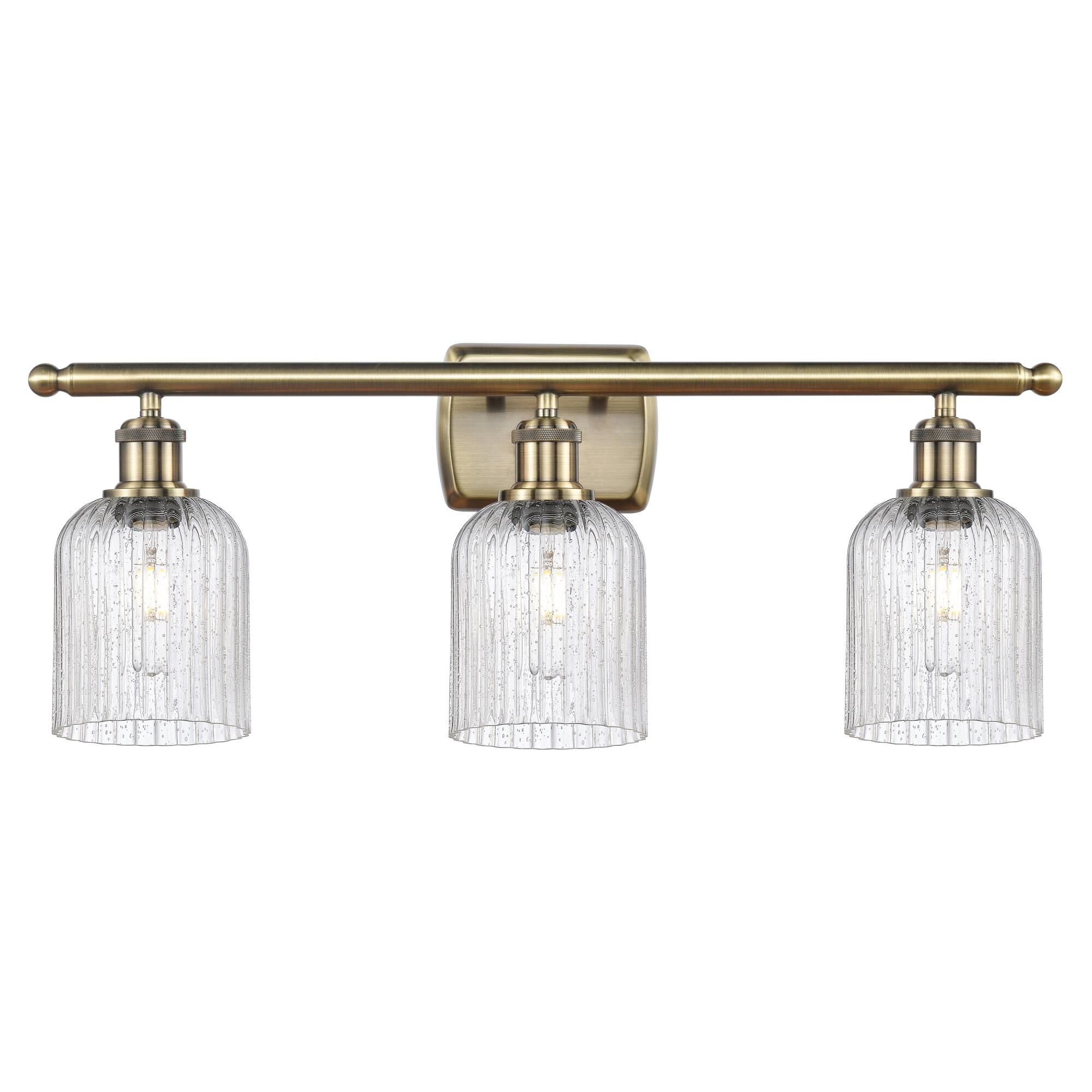 Shown in Antique Brass finish and Seedy shade