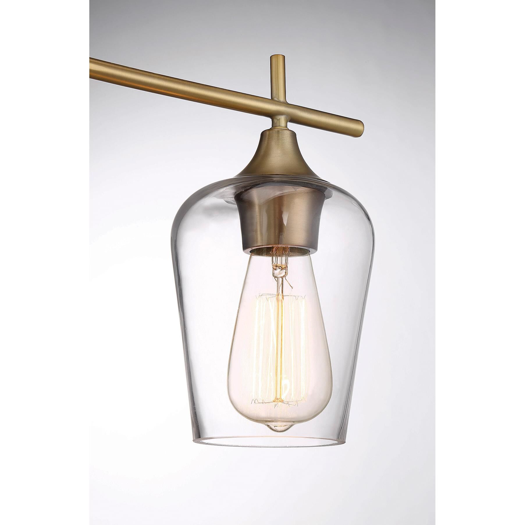 Shown in Warm Brass finish and Clear glass