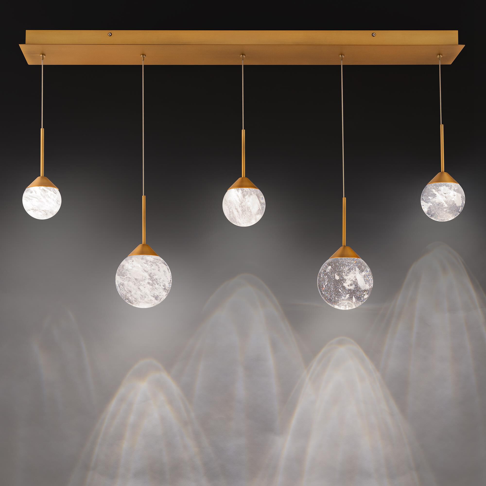 Shown in Aged Brass finish and Optic Haze Quartz Crystal crystal