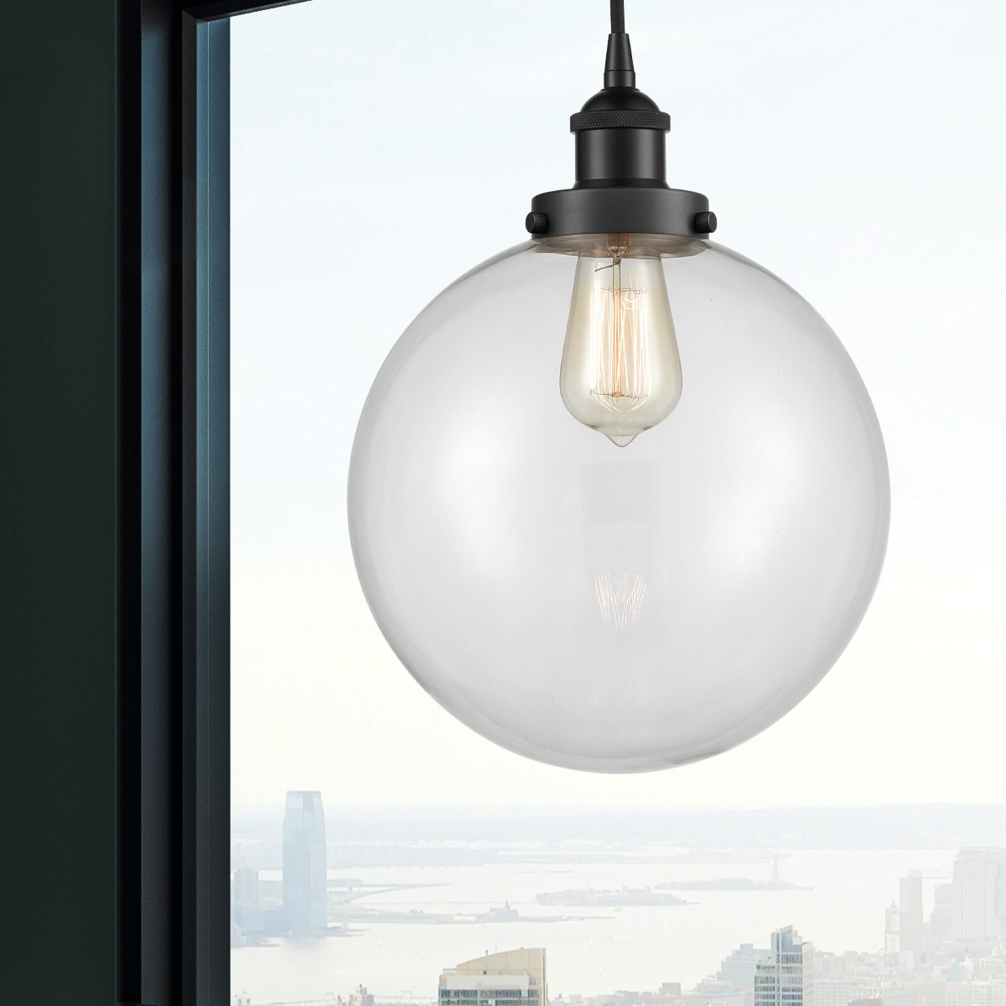 Shown in Matte Black finish and Clear Beacon glass