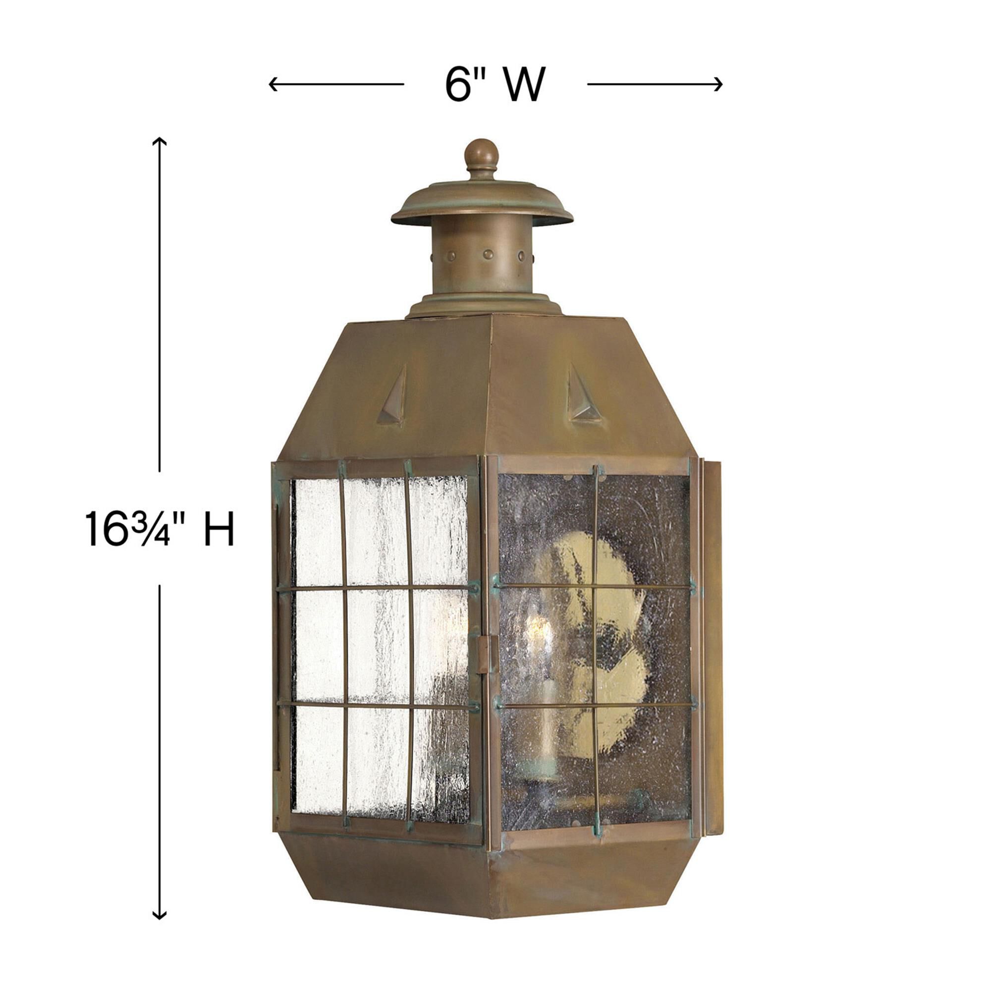 Shown in Aged Brass finish and Clear Seedy Panels glass