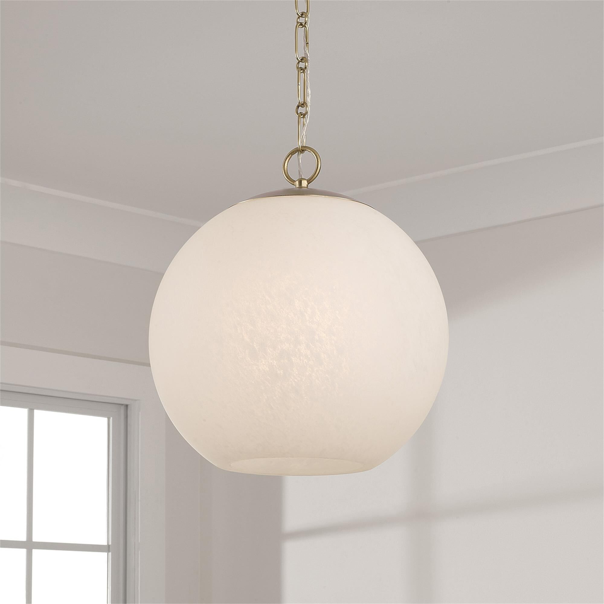 Shown in Matte Brass finish and Faux Alabaster glass