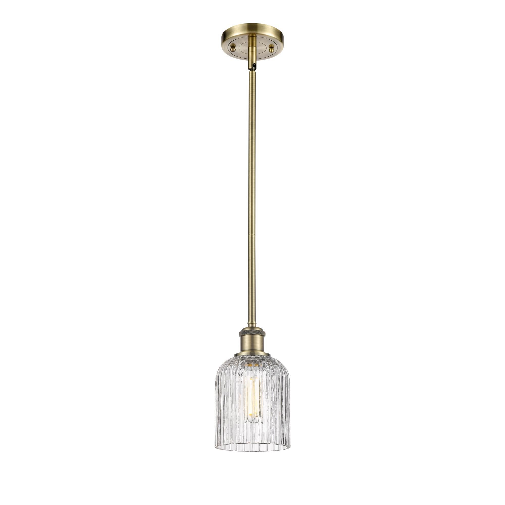 Shown in Antique Brass finish and Clear glass