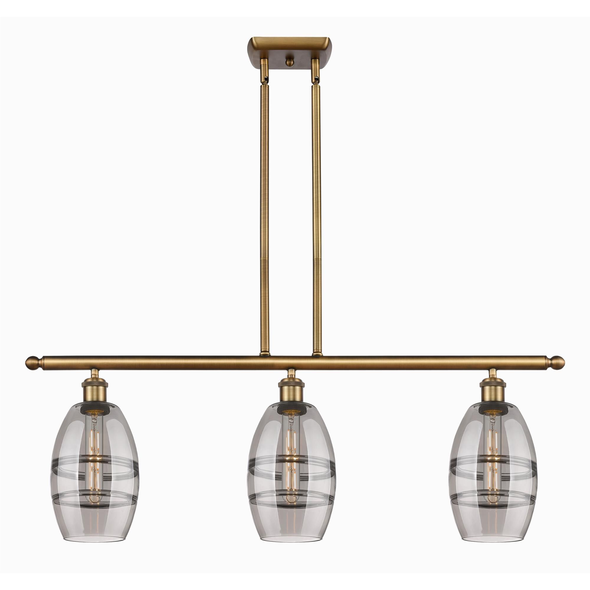 Shown in Brushed Brass finish and Light Smoke glass