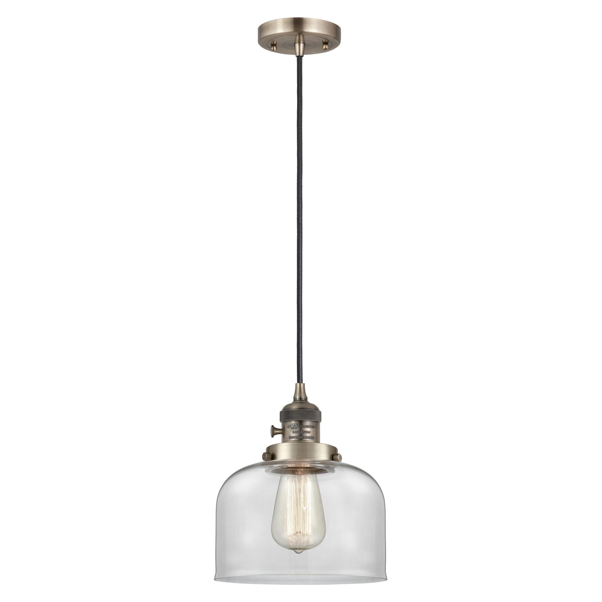 Shown in Antique Brass finish and Clear glass