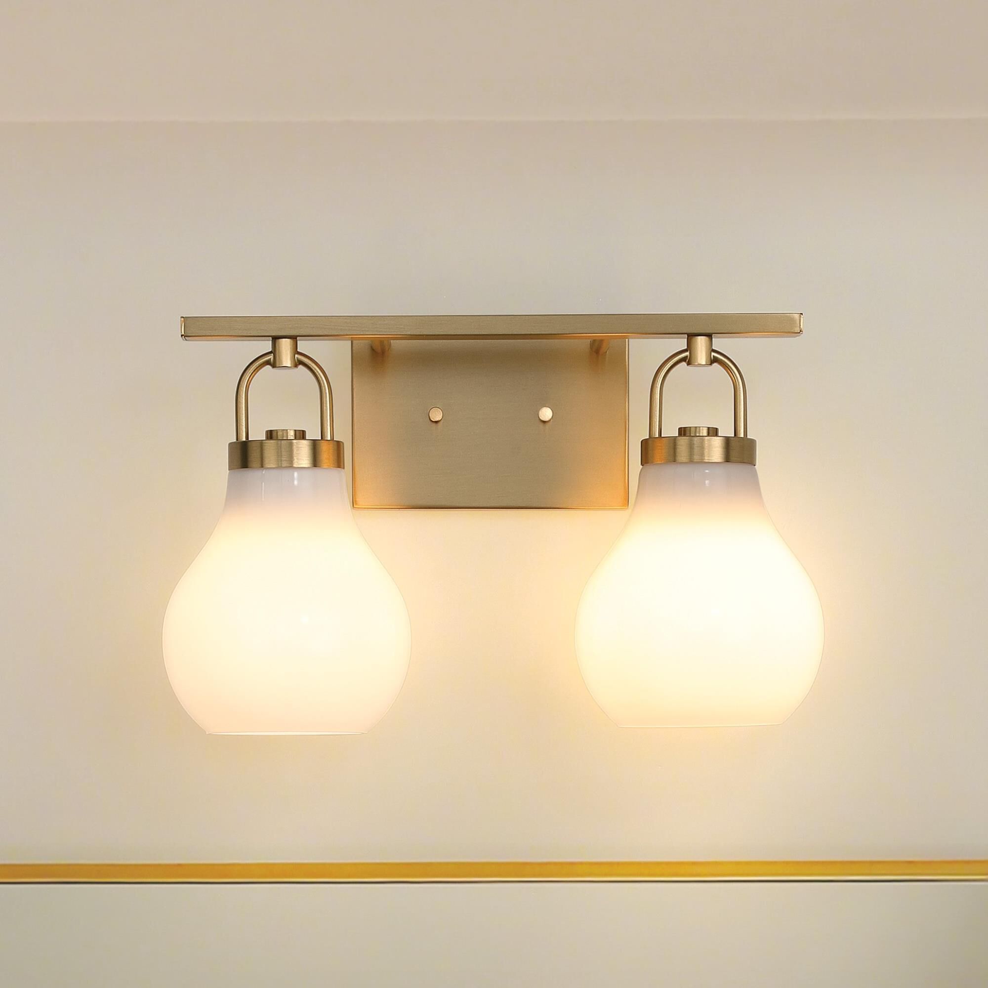 Shown in Champagne Gold finish and Opal glass