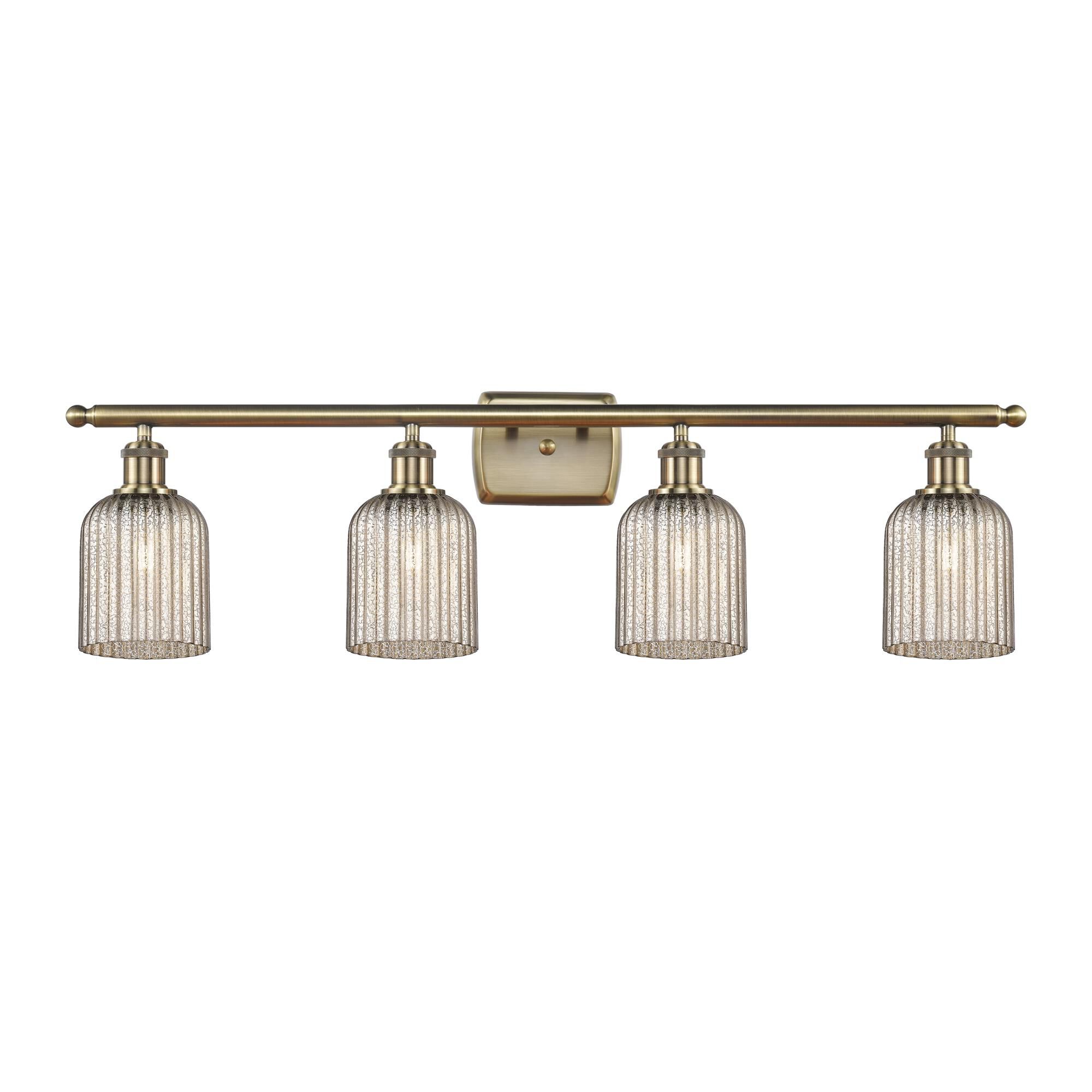 Shown in Antique Brass finish and Mercury shade