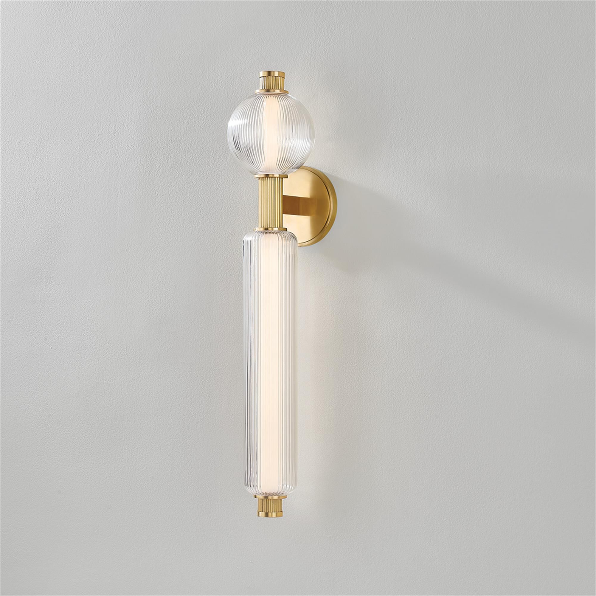 Shown in Vintage Brass finish and Clear glass