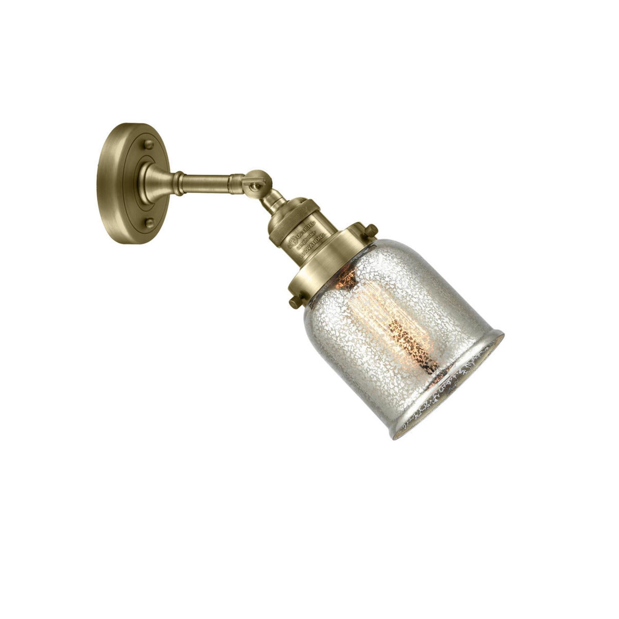 Shown in Antique Brass finish and Silver Mercury glass and None accent
