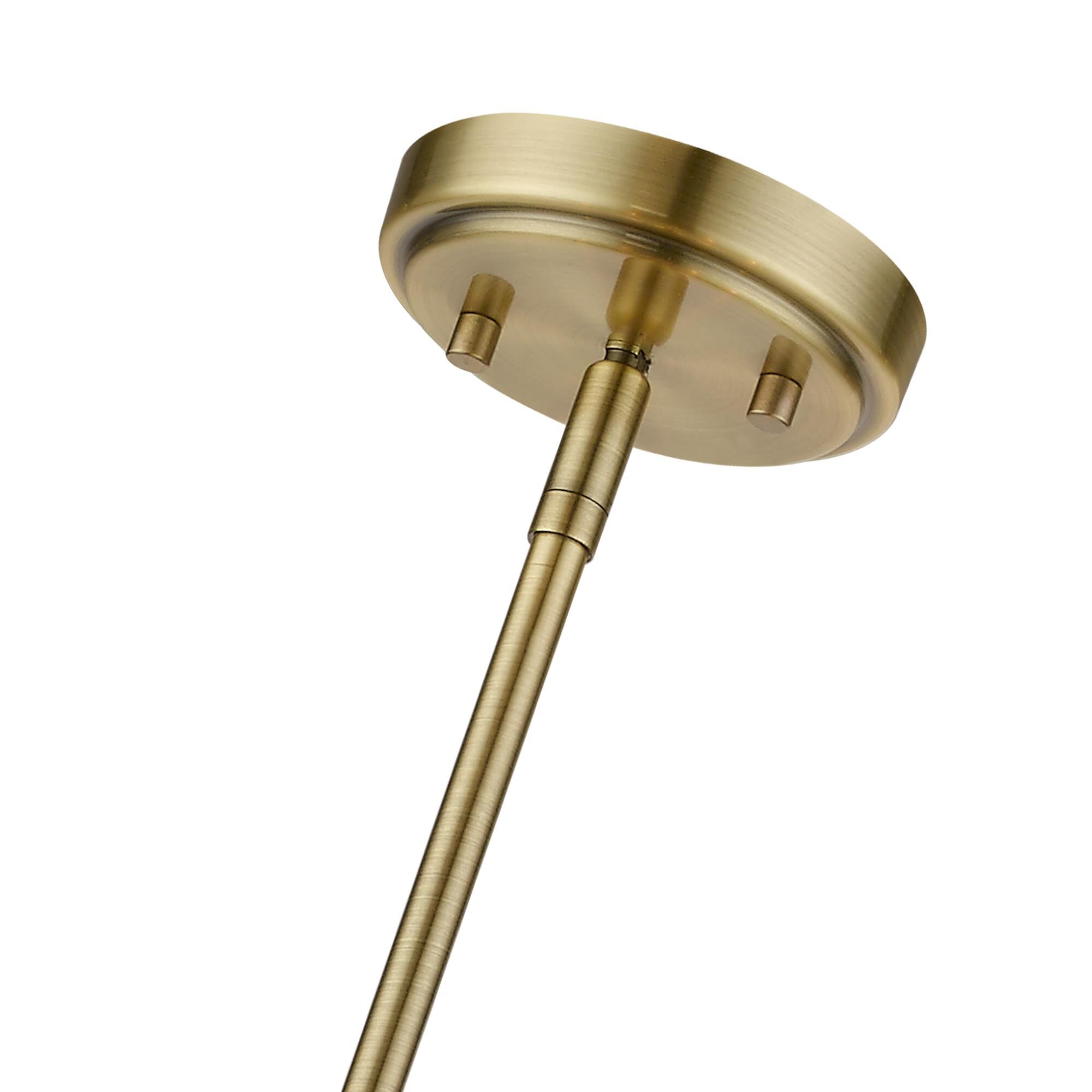 Shown in Antique Brass finish and Hand Crafted Oatmeal Color Hardback Fabric With White Fabric Inside shade