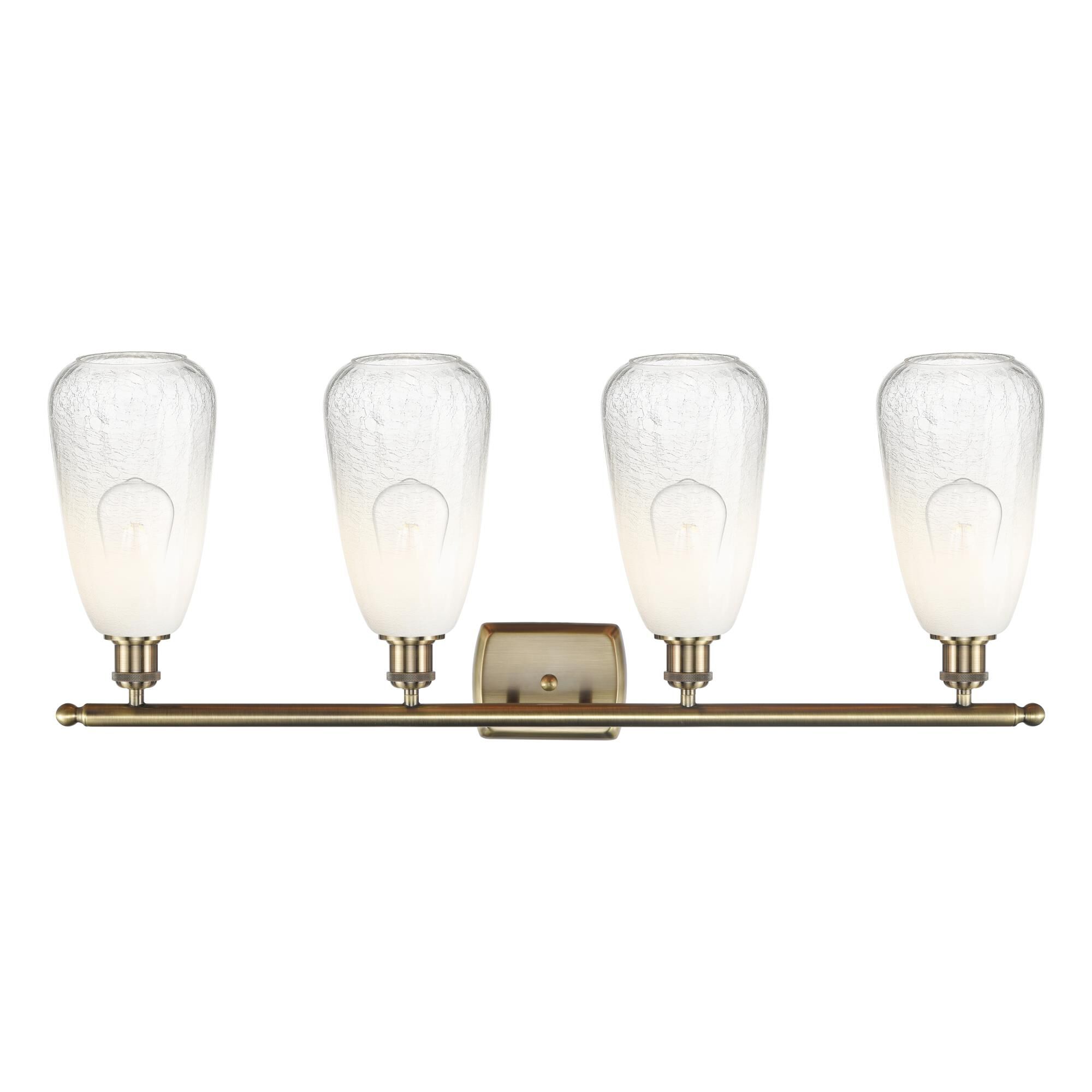 Shown in Antique Brass finish and Opal glass