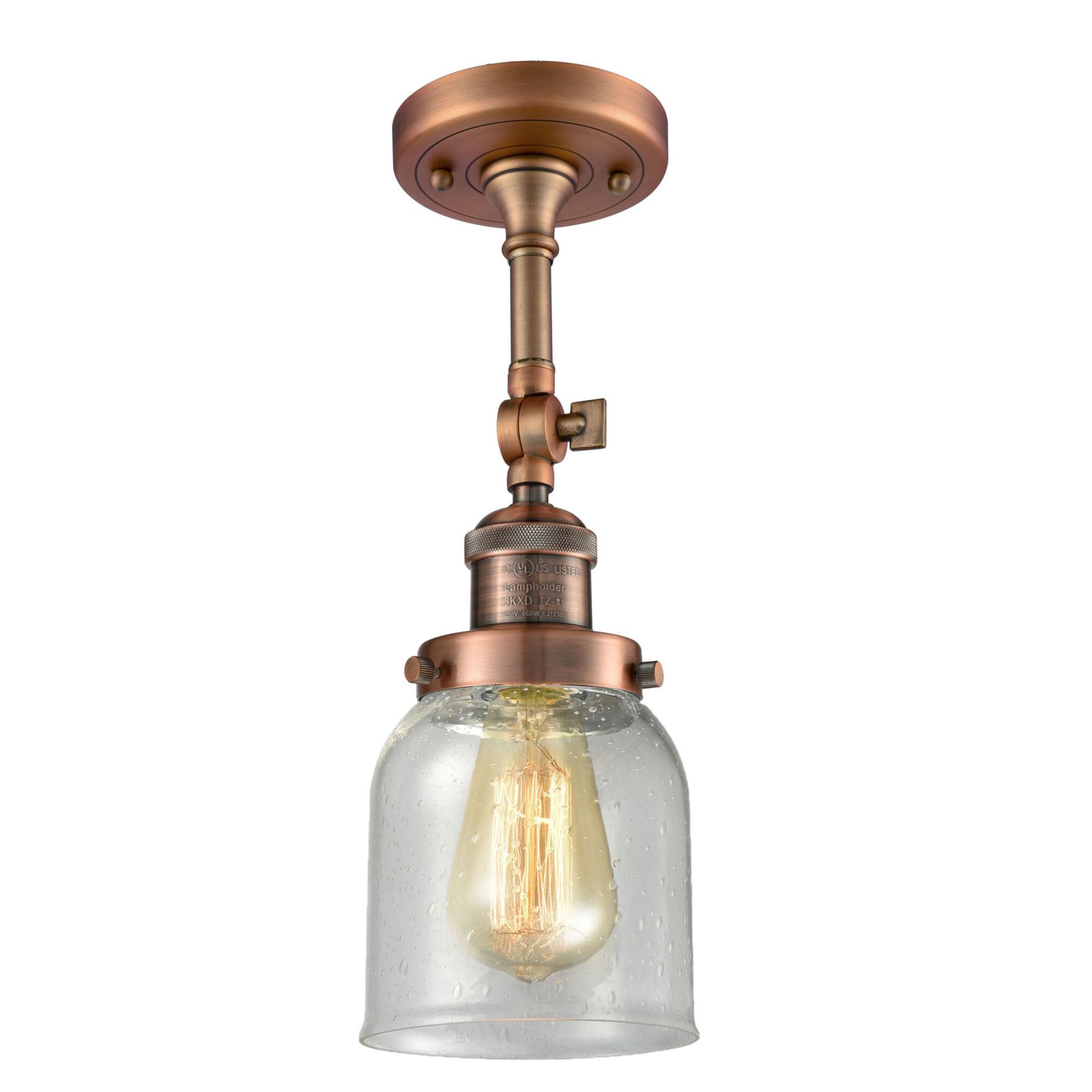 Shown in Antique Copper finish and Seedy glass and None accent