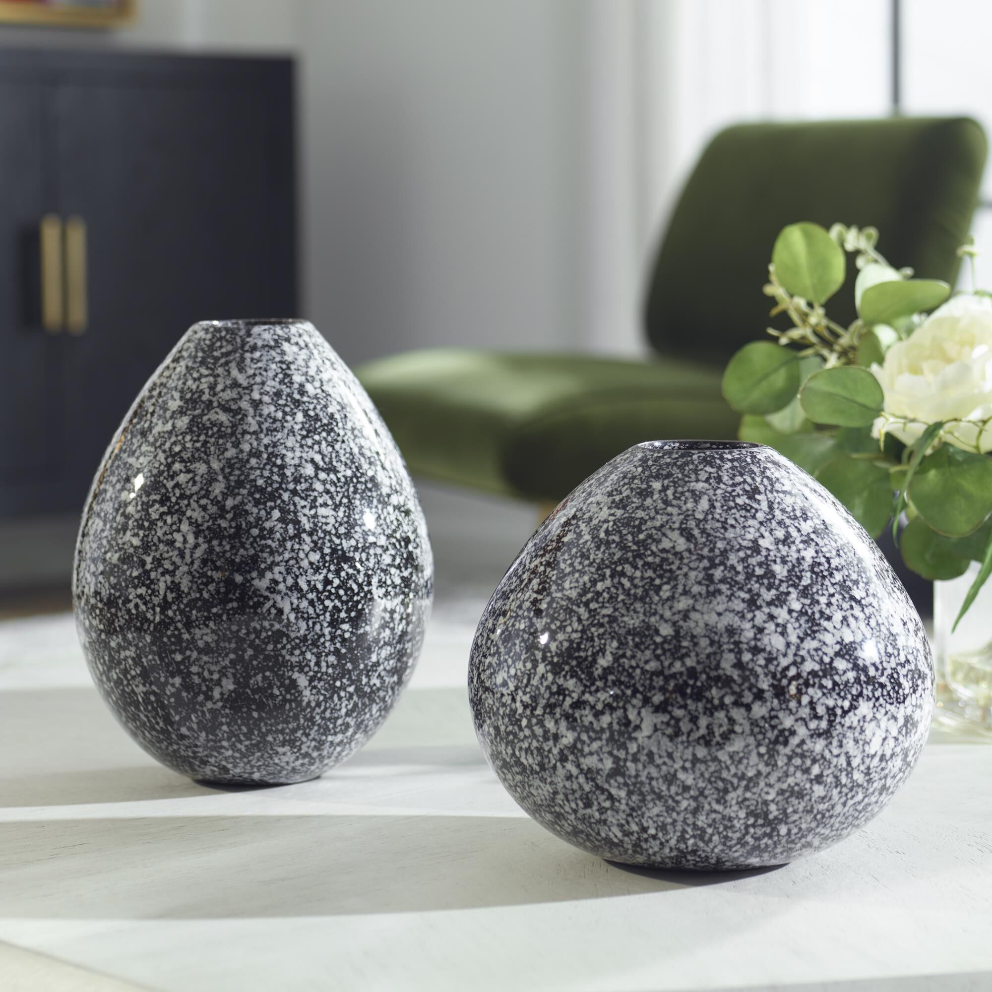 Shown in Set Of Two, Ceramic Vases Embrace A Timeless And Sophisticated Combination Of Black And White. This  finish