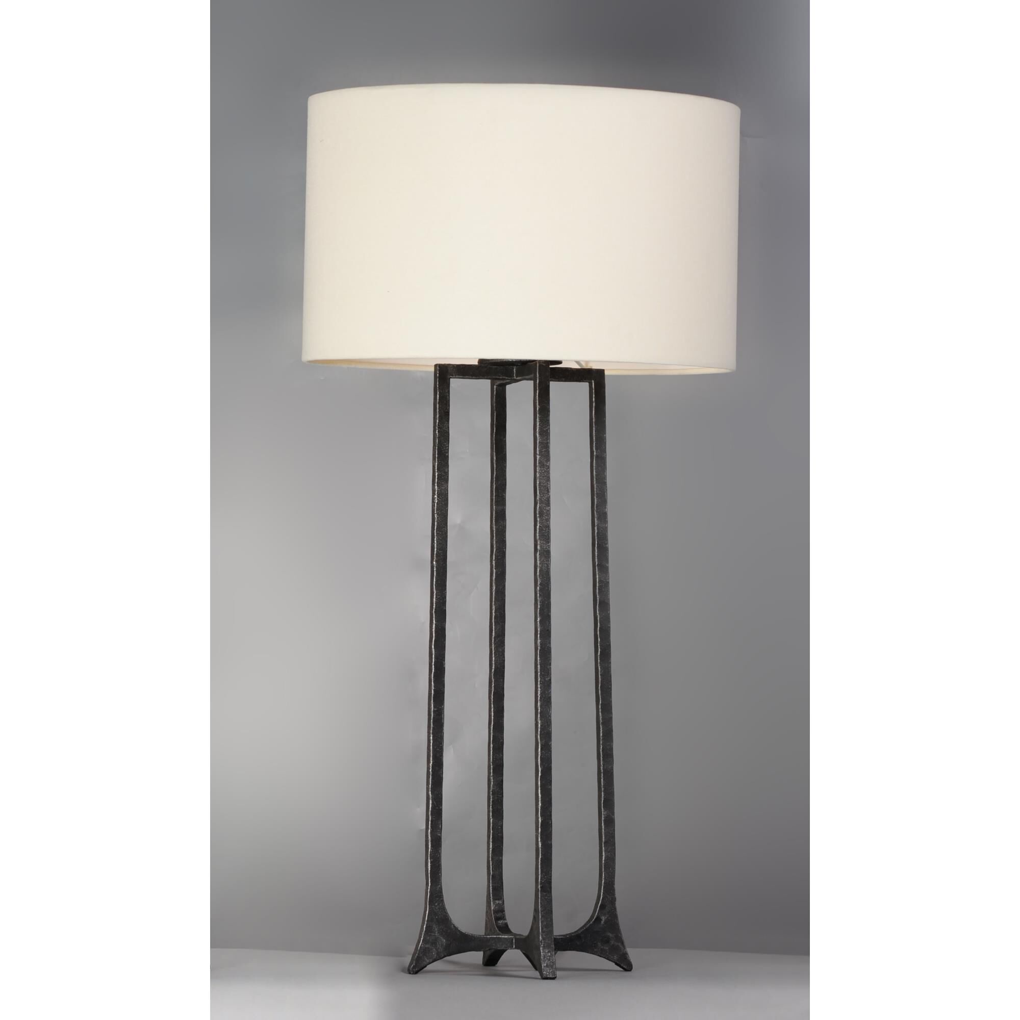 Shown in Natural Iron finish and Canvas Fabric shade