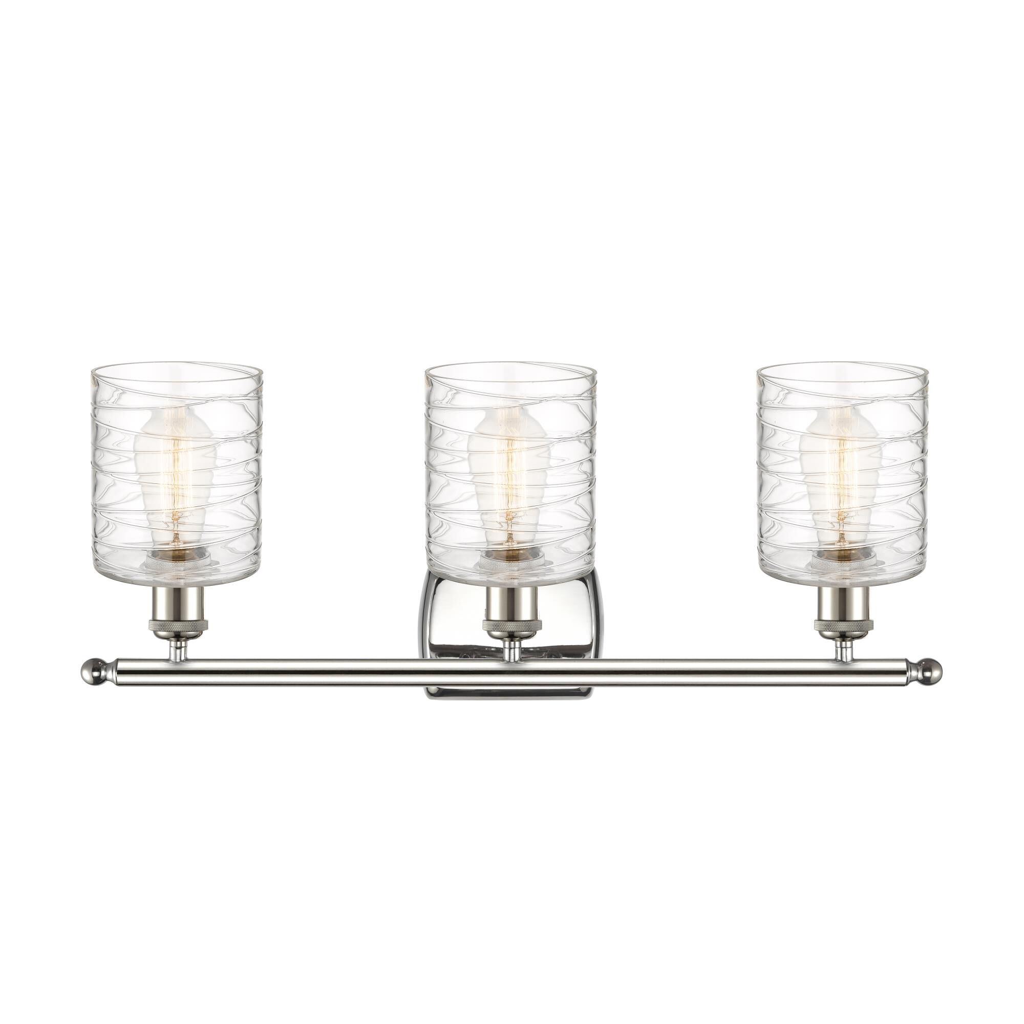 Shown in Polished Nickel finish and Deco Swirl glass