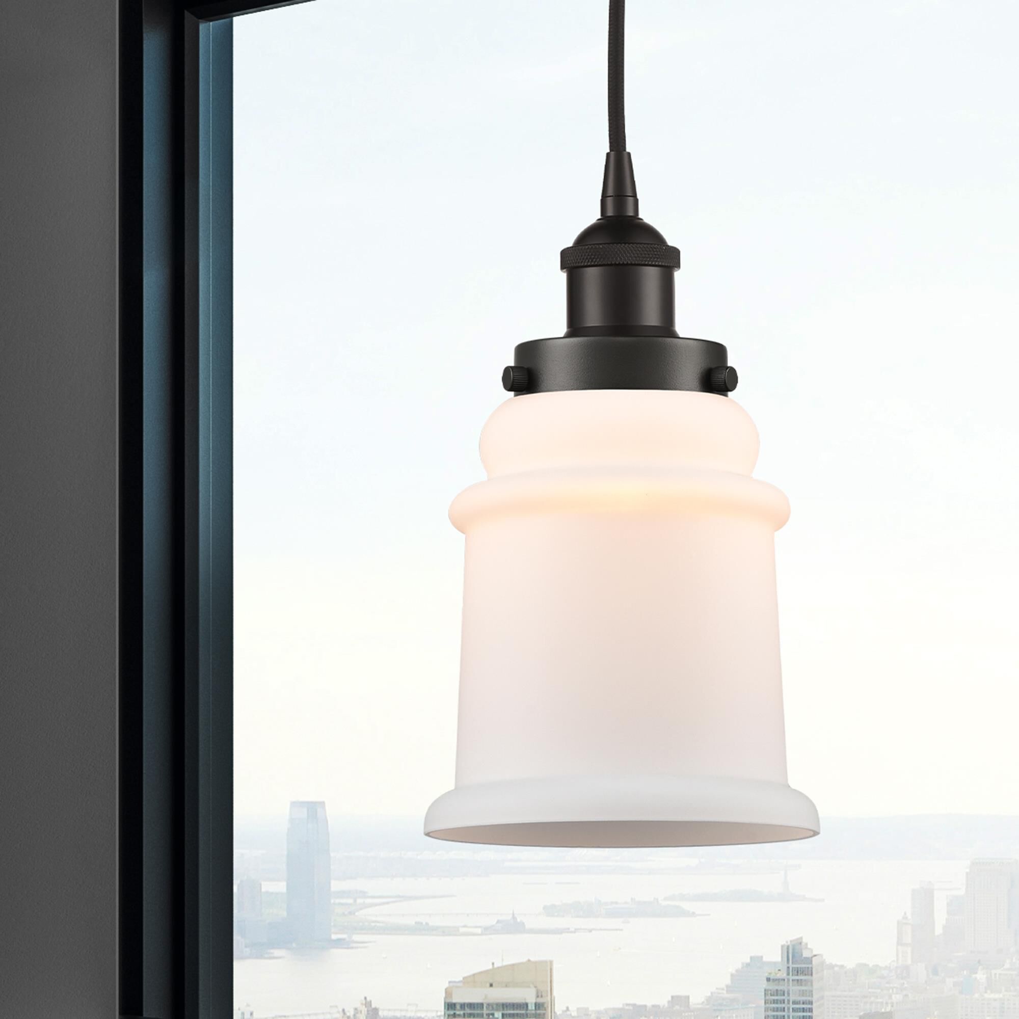 Shown in Oil Rubbed Bronze finish and Matte White glass