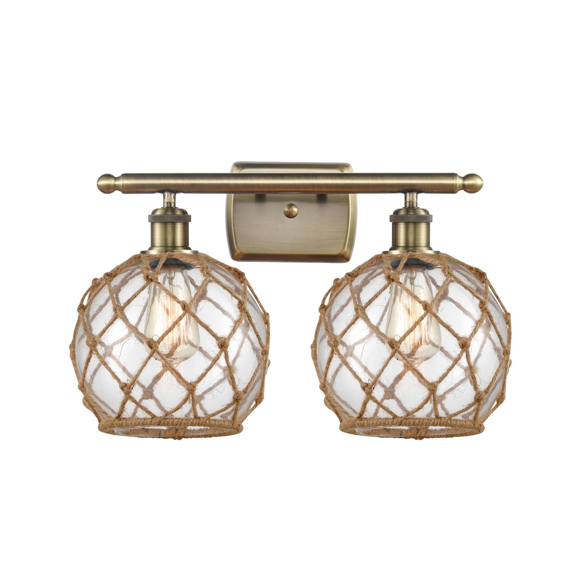 Shown in Antique Brass finish and Sphere glass and Glass And Rope shade