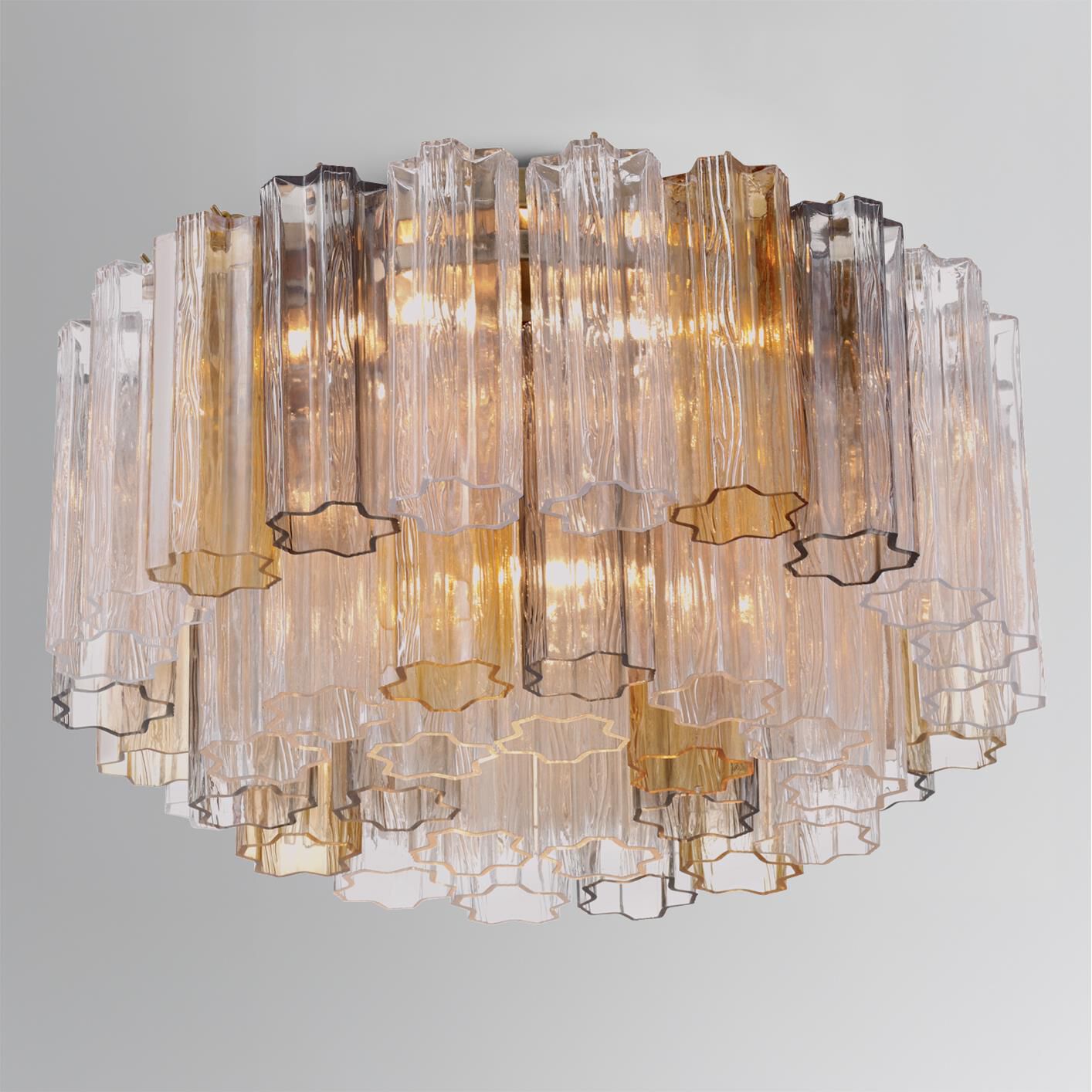 Shown in Aged Brass finish and Tronchi Autumn glass