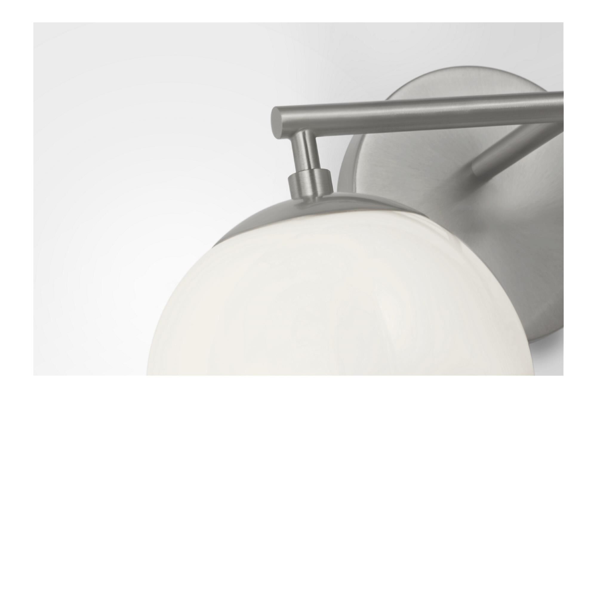Shown in Brushed Nickel finish and Clear White glass