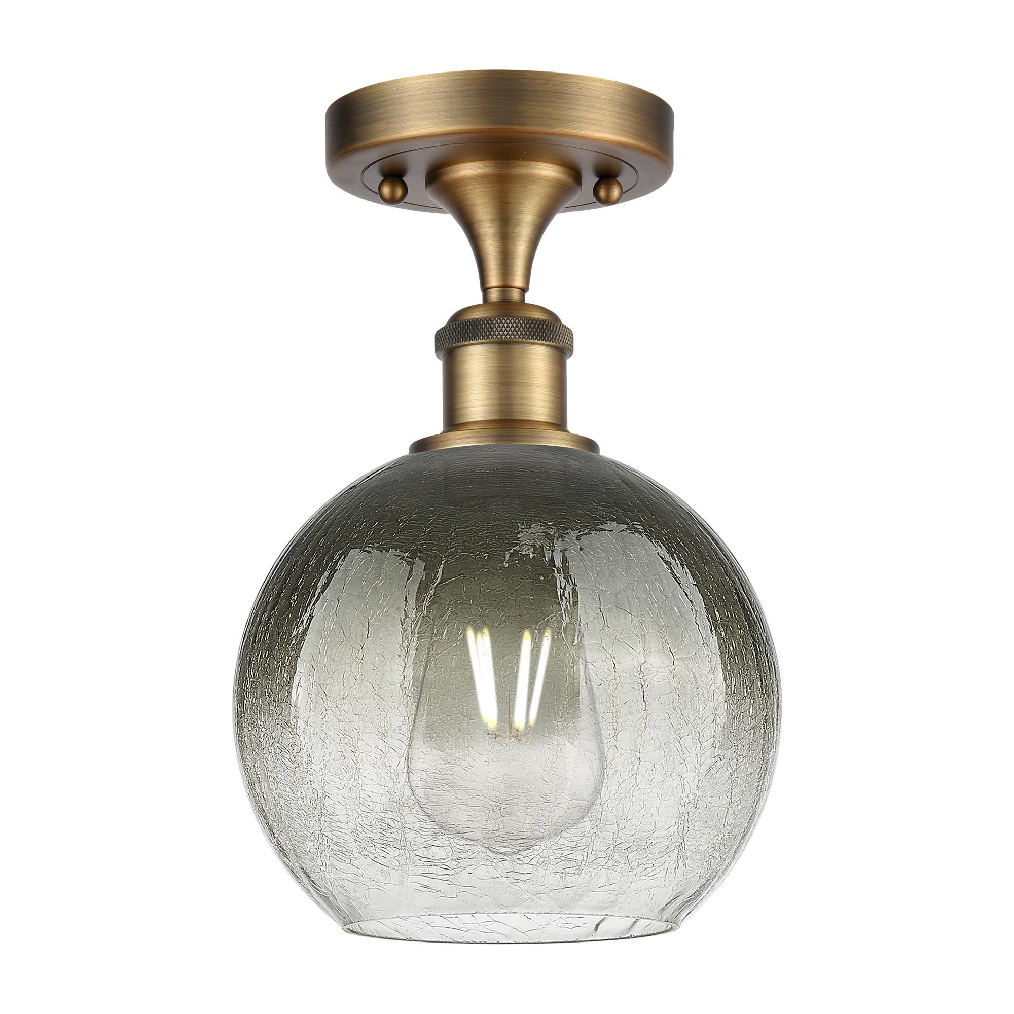 Shown in Brushed Brass finish and Slate glass