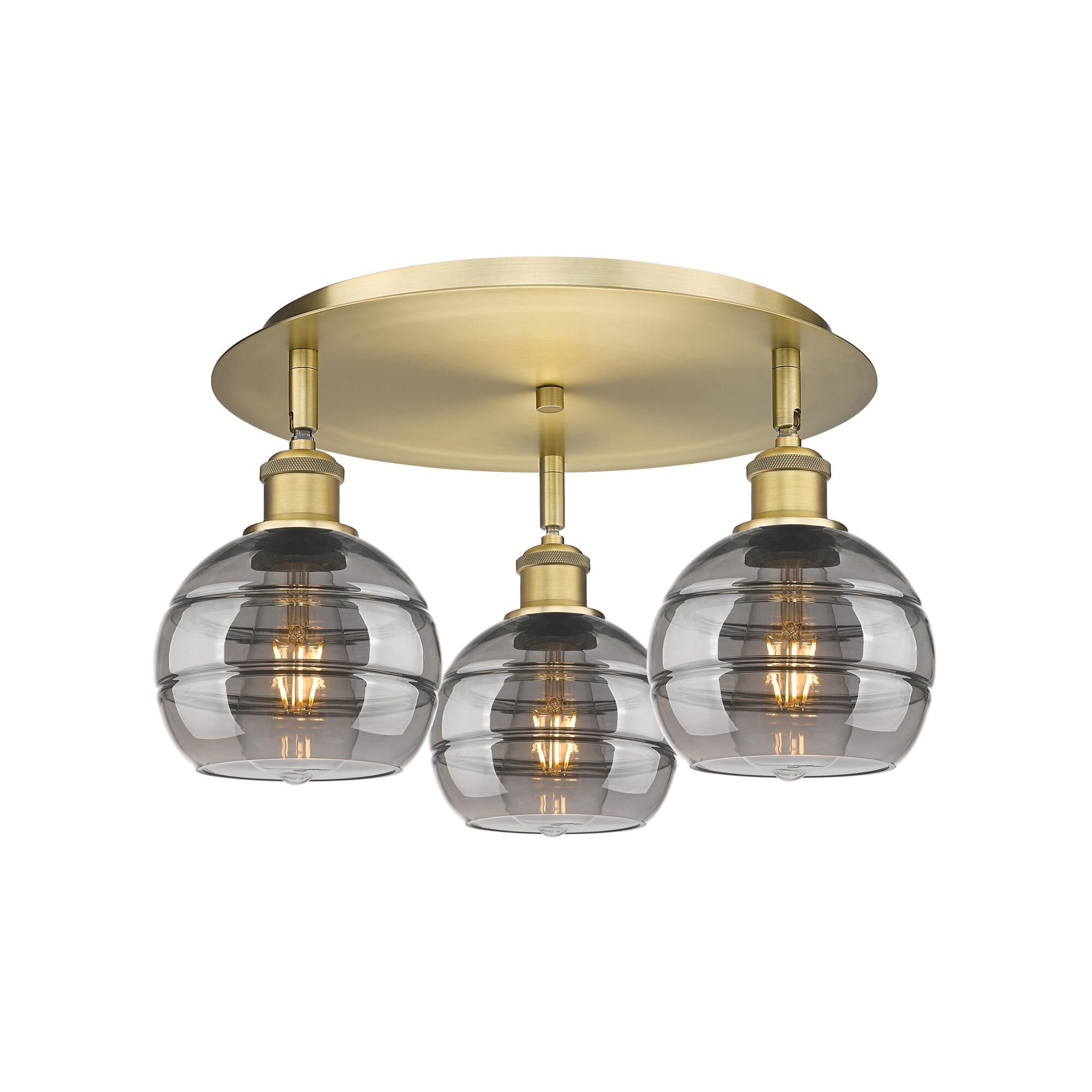 Shown in Brushed Brass finish and Light Smoke glass