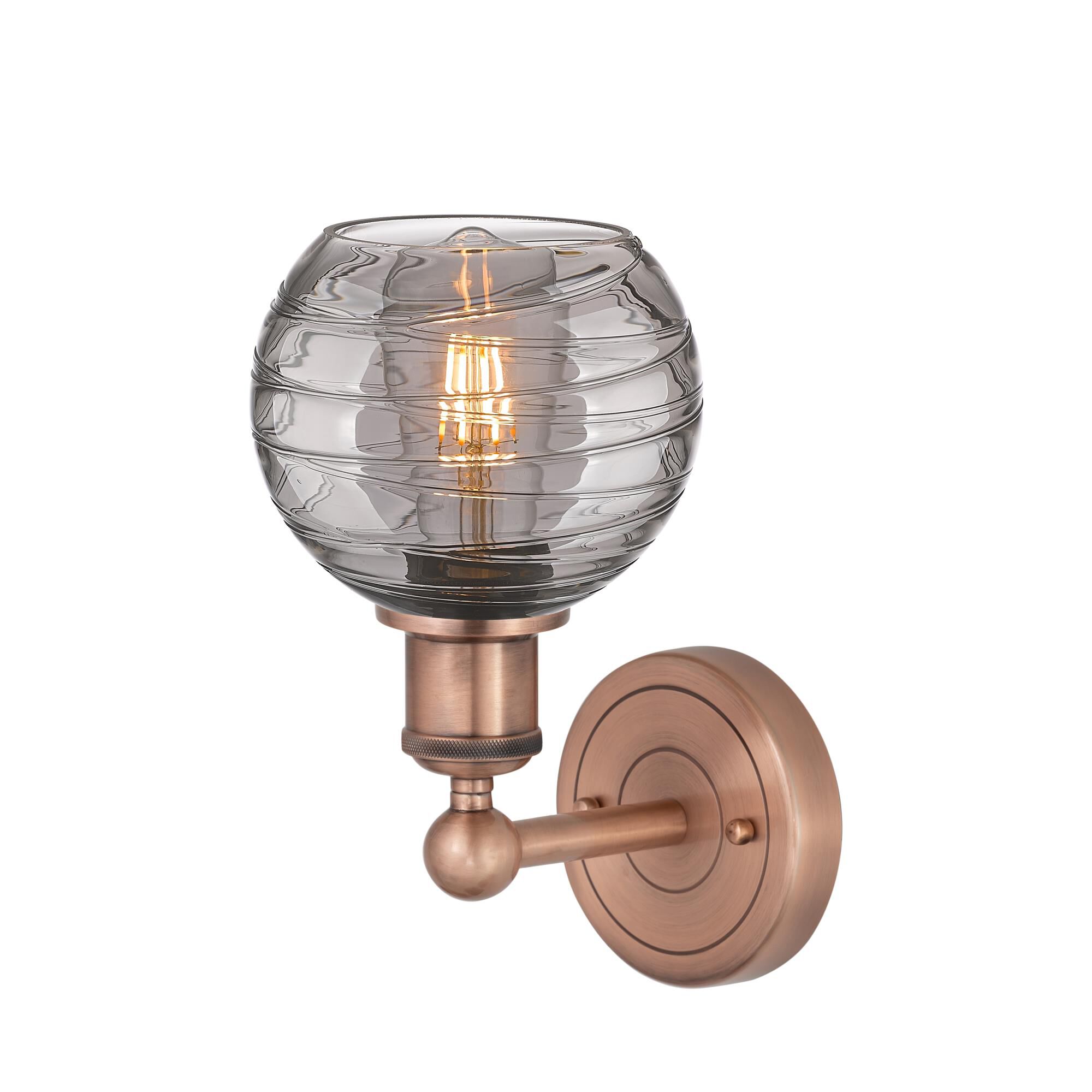 Shown in Antique Copper finish and Light Smoke Deco Swirl glass