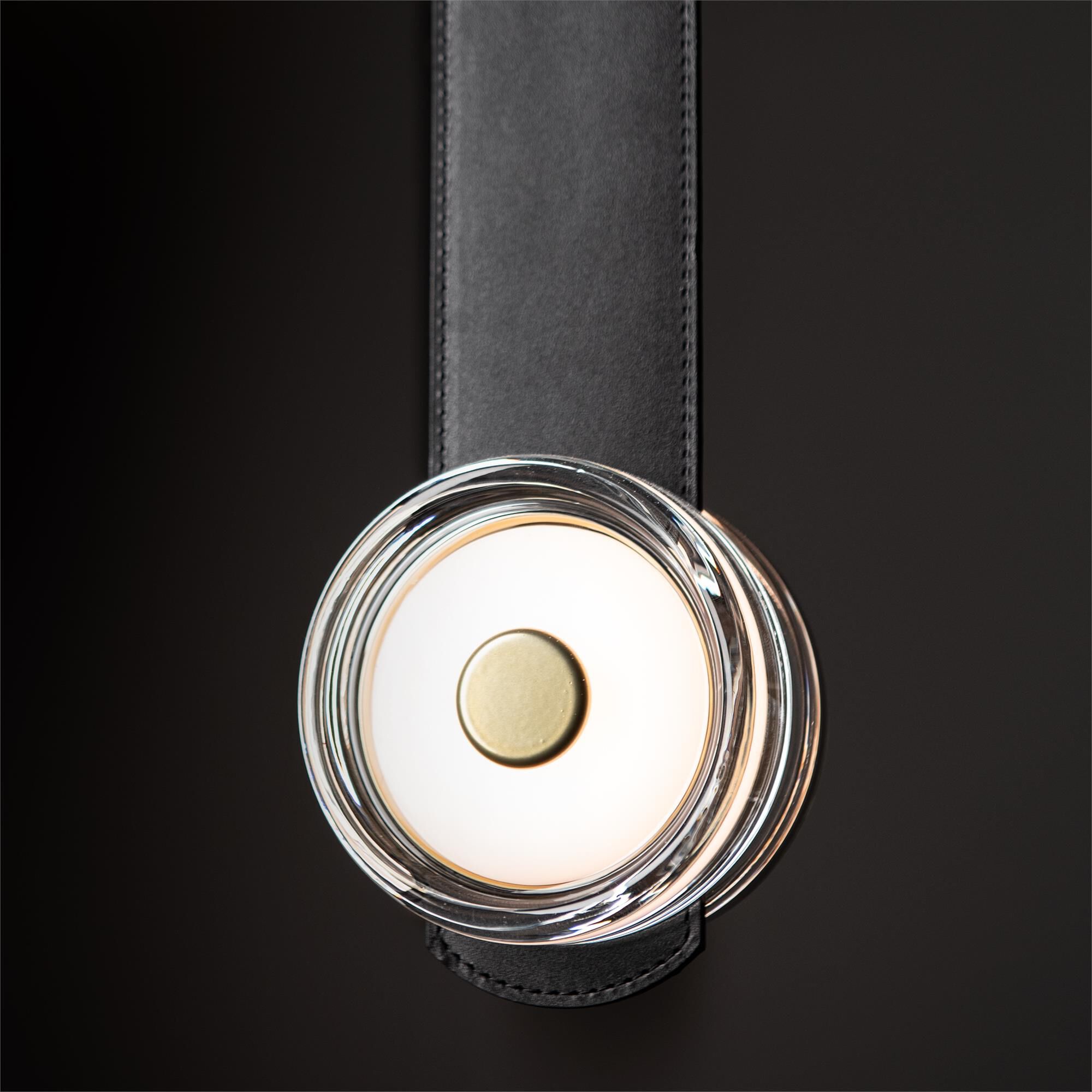 Shown in Modern Brass finish and Clear glass and Black Leather accent