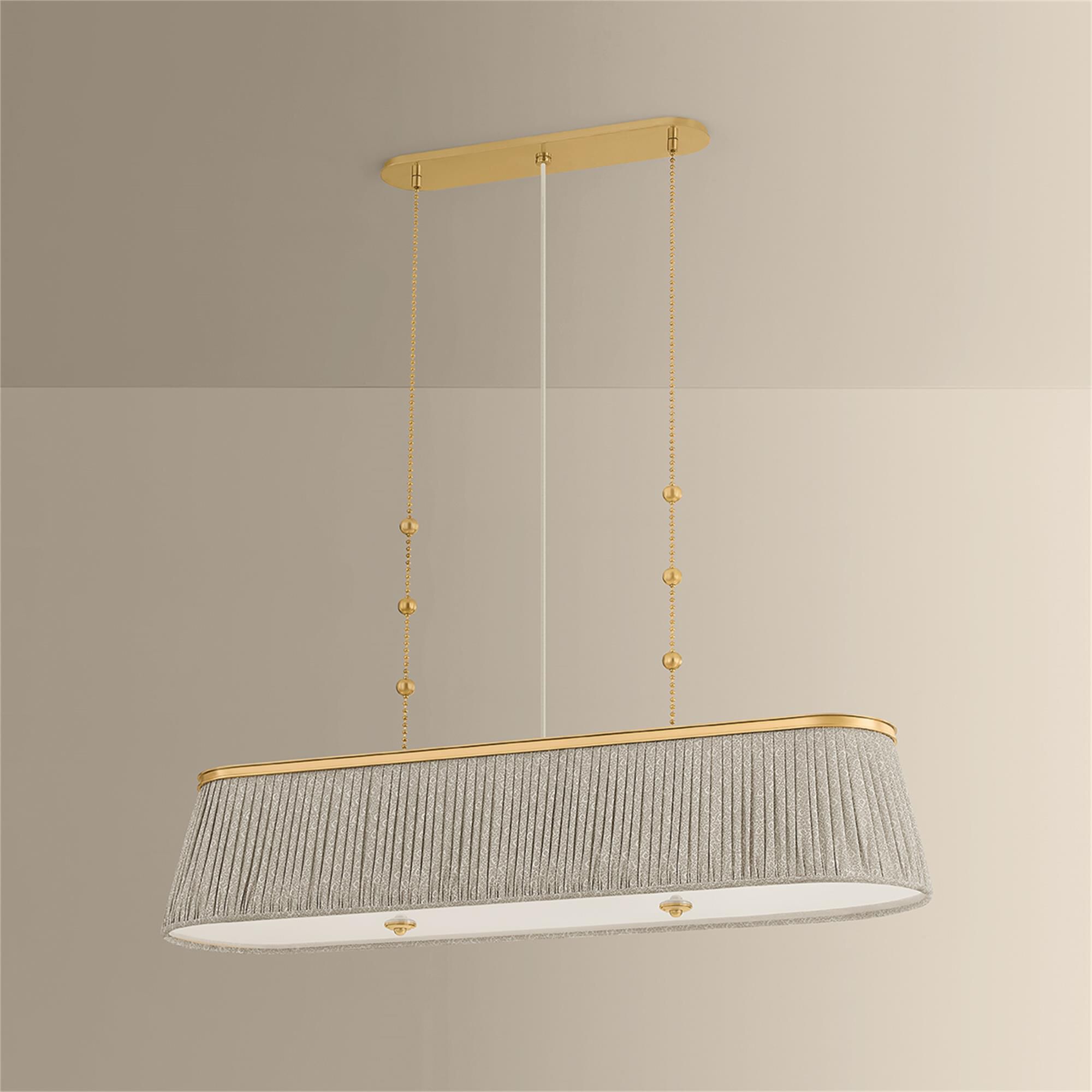 Shown in Aged Brass finish and Gathered Printed Cotton shade