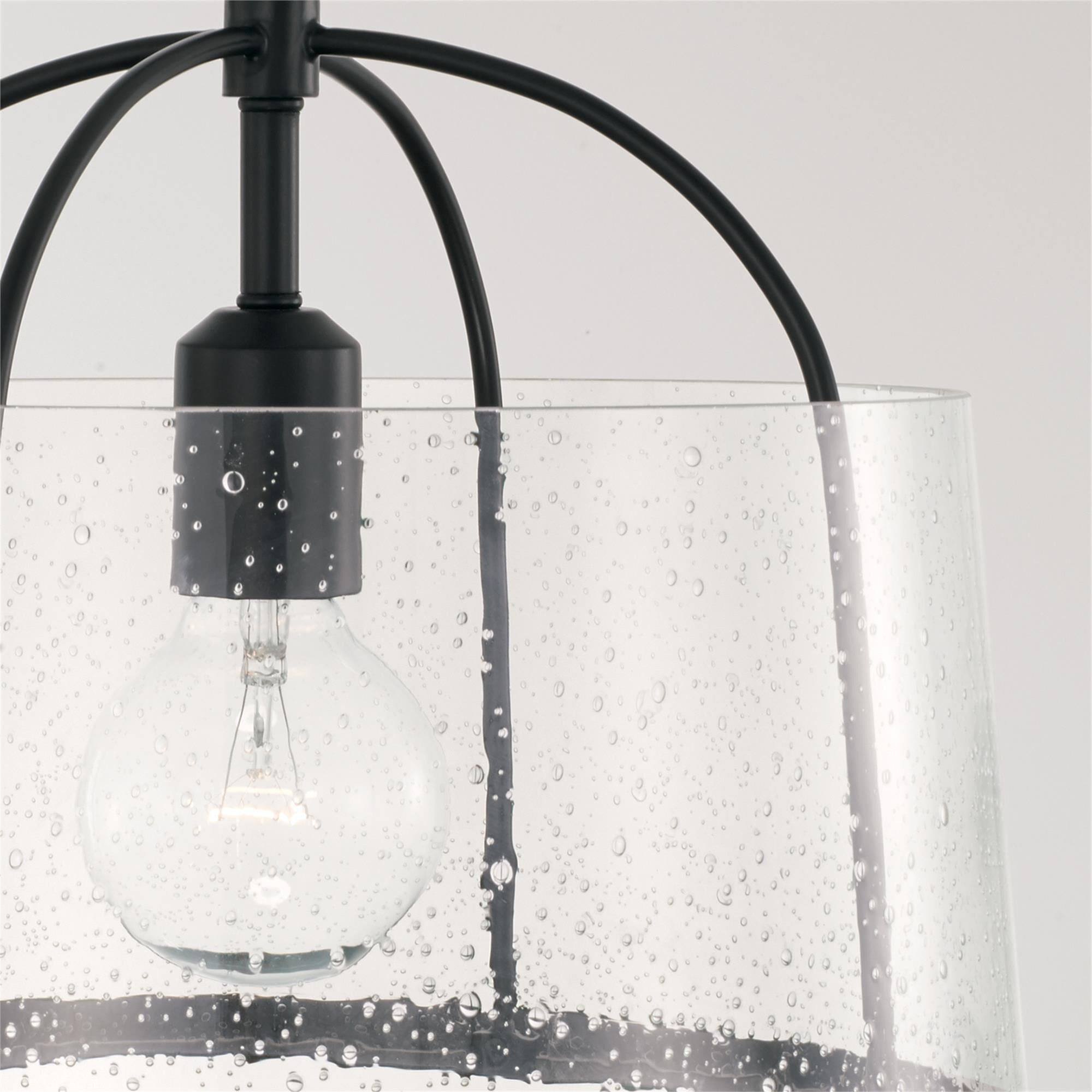 Shown in Matte Black finish and Clear Seeded glass