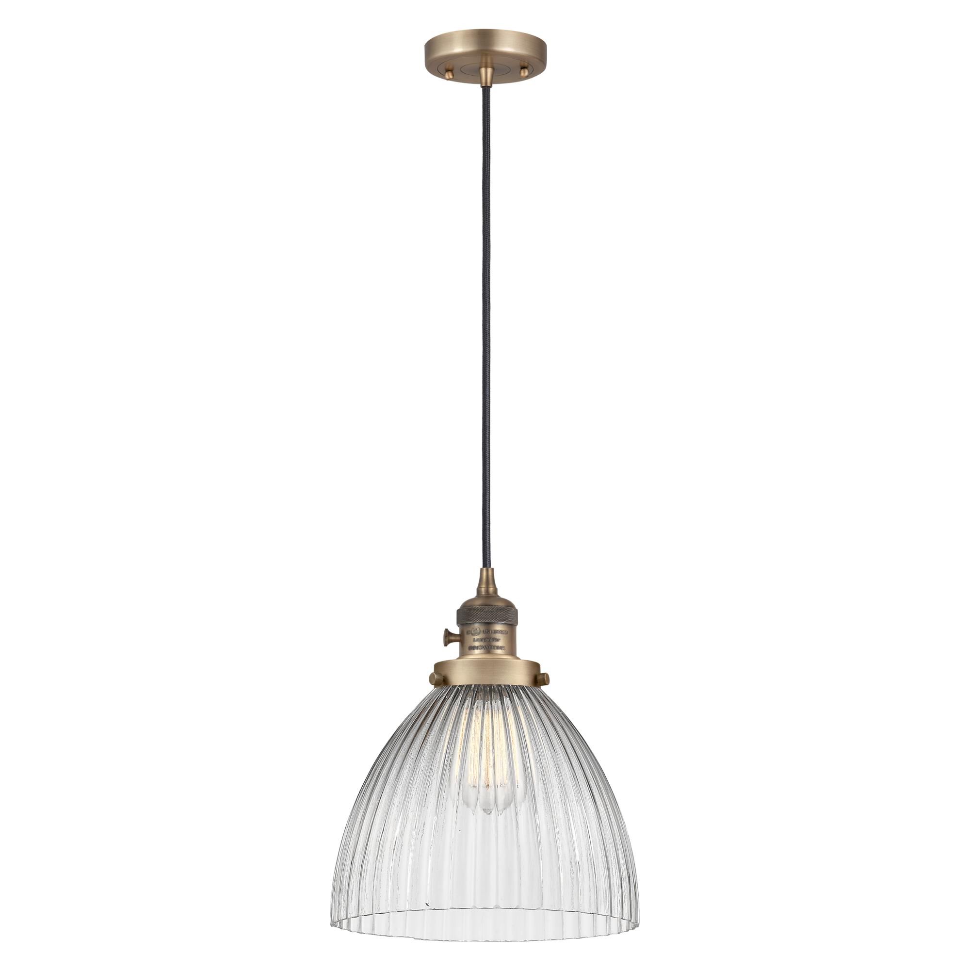 Shown in Brushed Brass finish and Clear glass