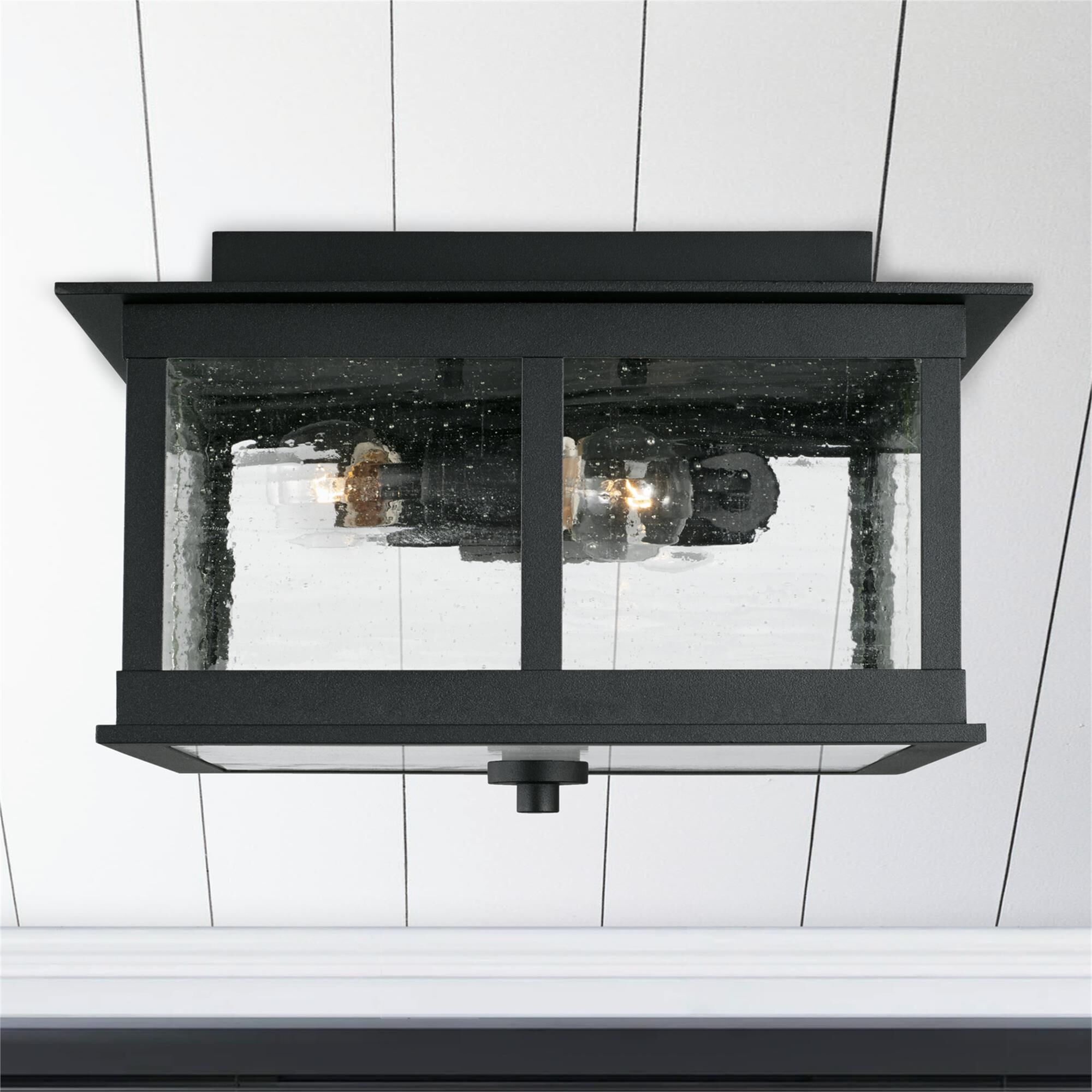 Shown in Black finish and Antiqued glass