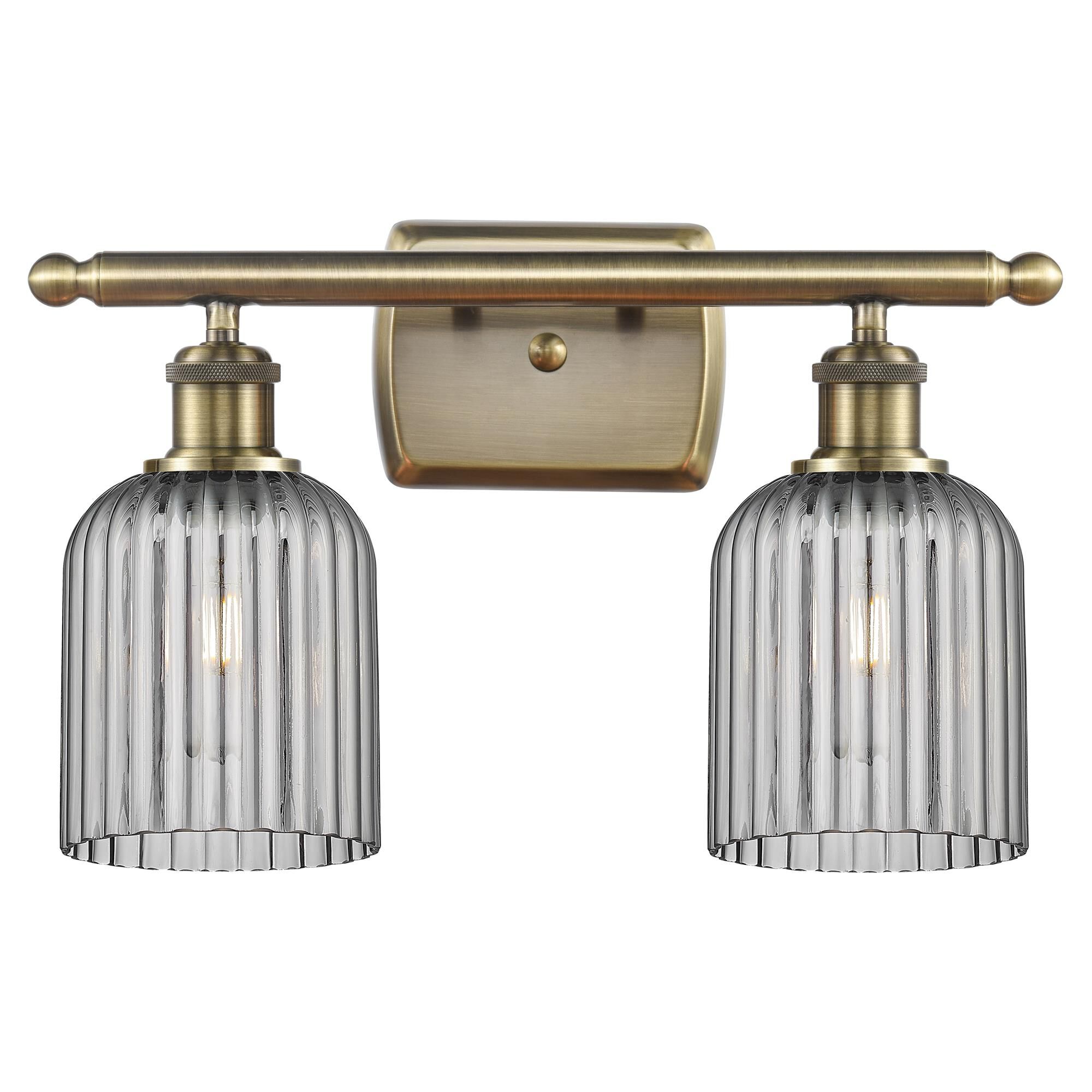 Shown in Antique Brass finish and Light Smoke shade