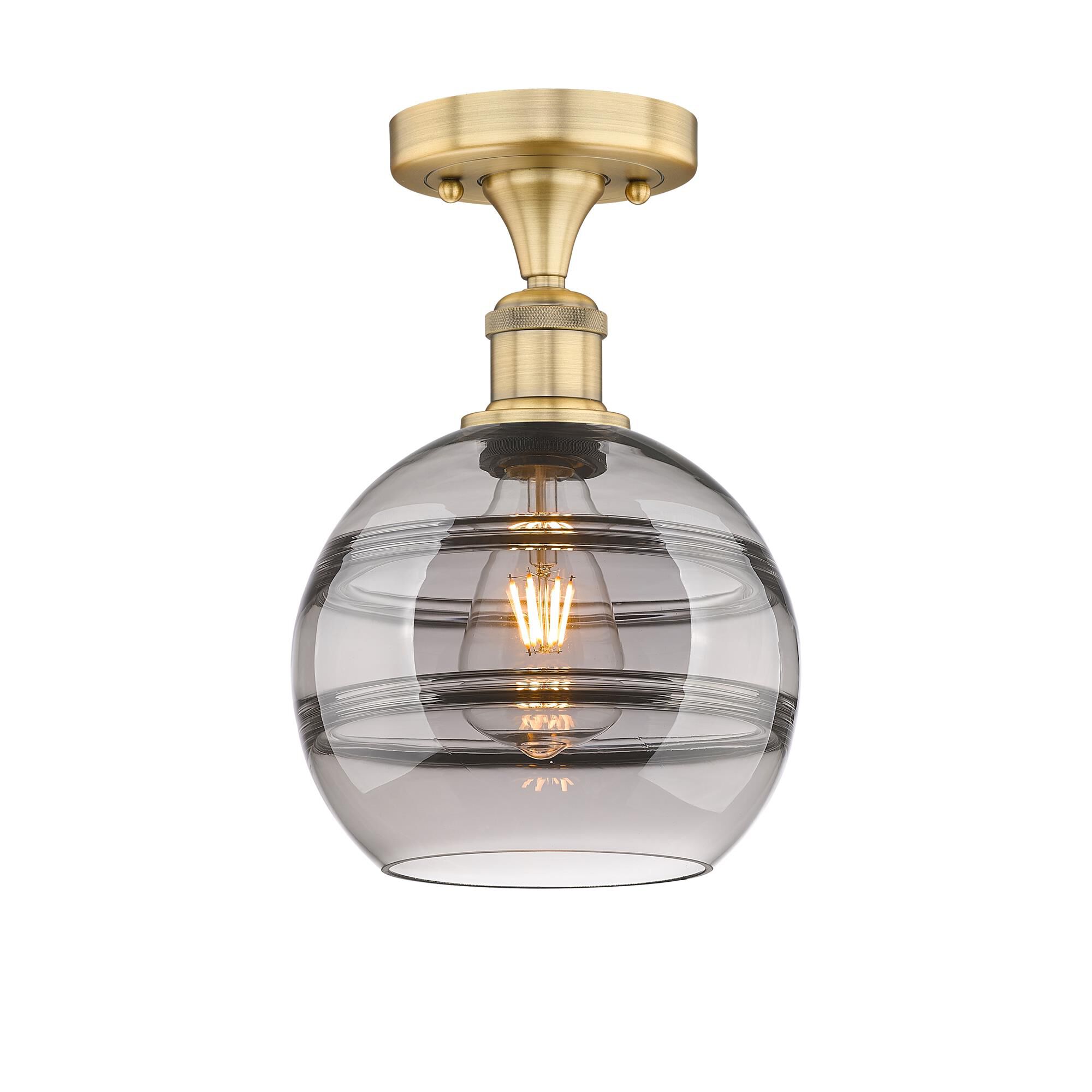 Shown in Brushed Brass finish and Light Smoke glass