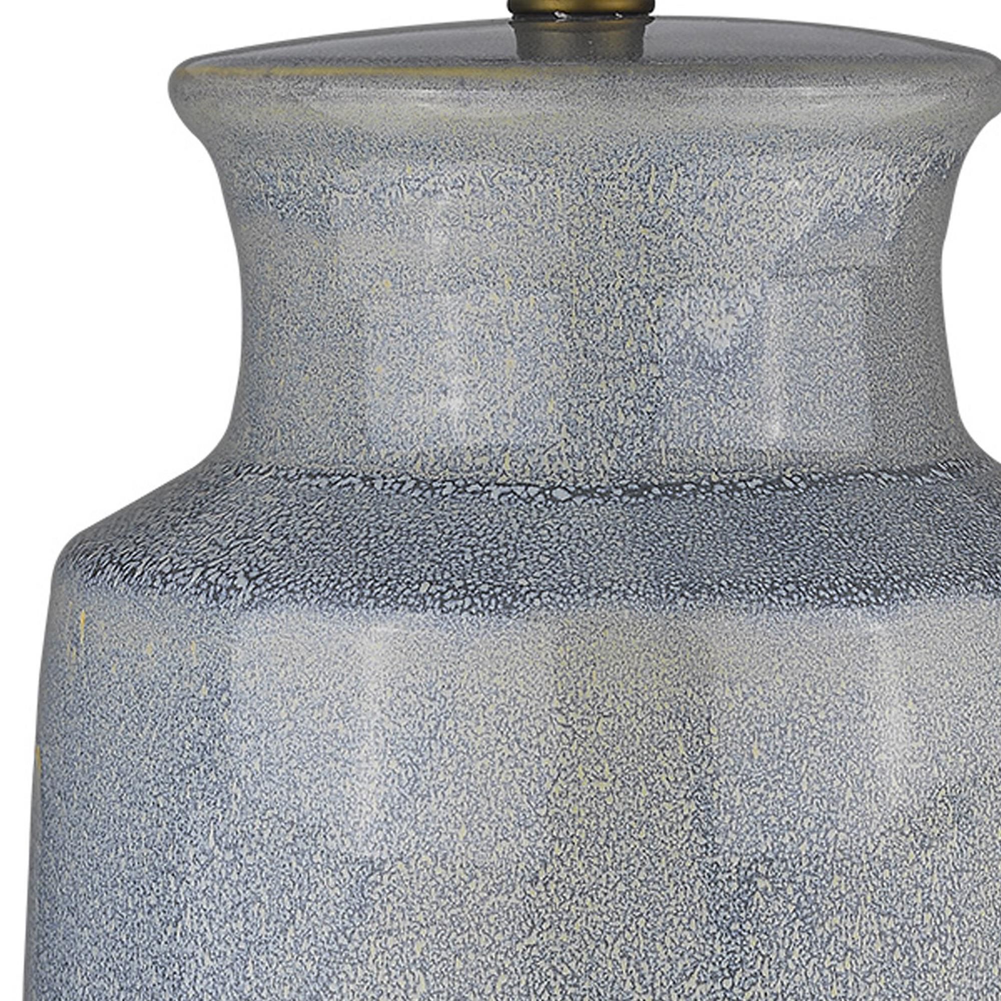 Shown in Brass finish and Seasalt glass and Seasalt Linen Tapered Drum shade