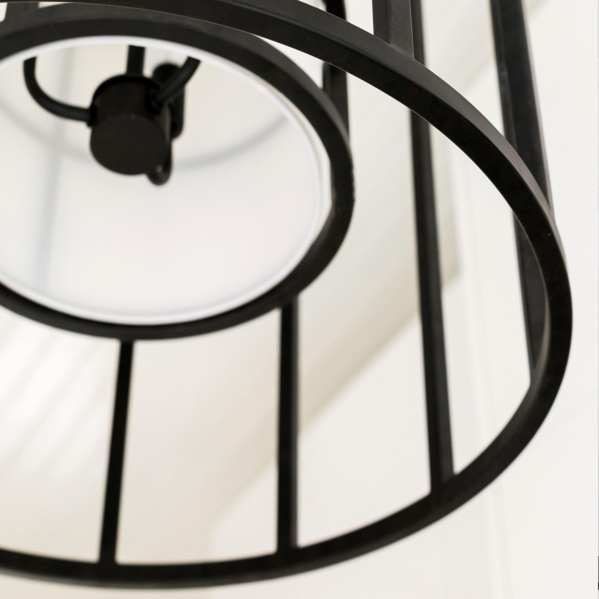 Shown in Matte Black finish and Silk glass and White shade