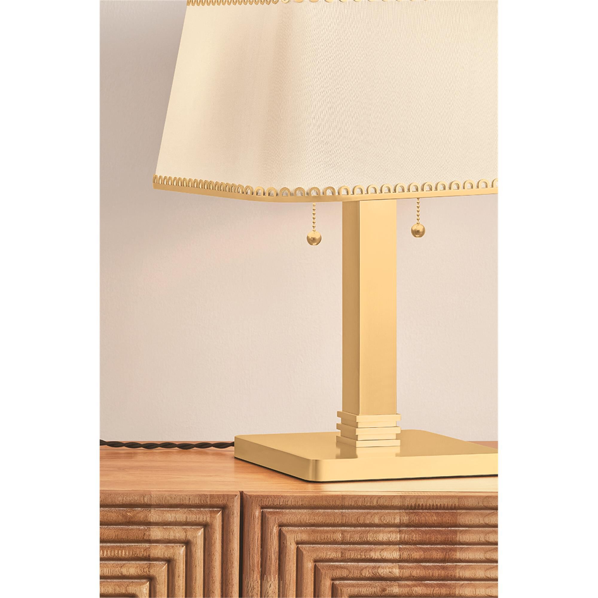 Shown in Aged Brass finish and Raw Silk shade