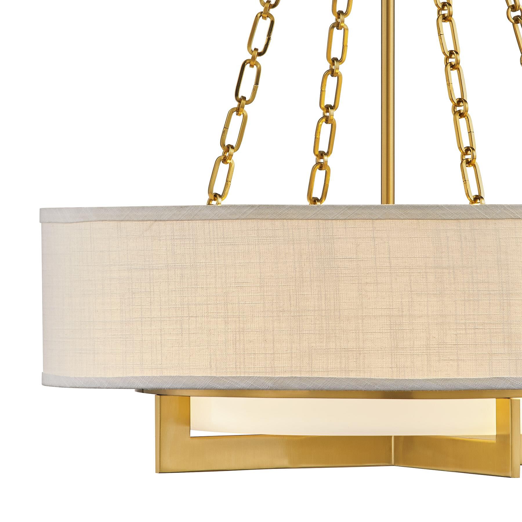 Shown in Warm Brass finish and White Linen shade