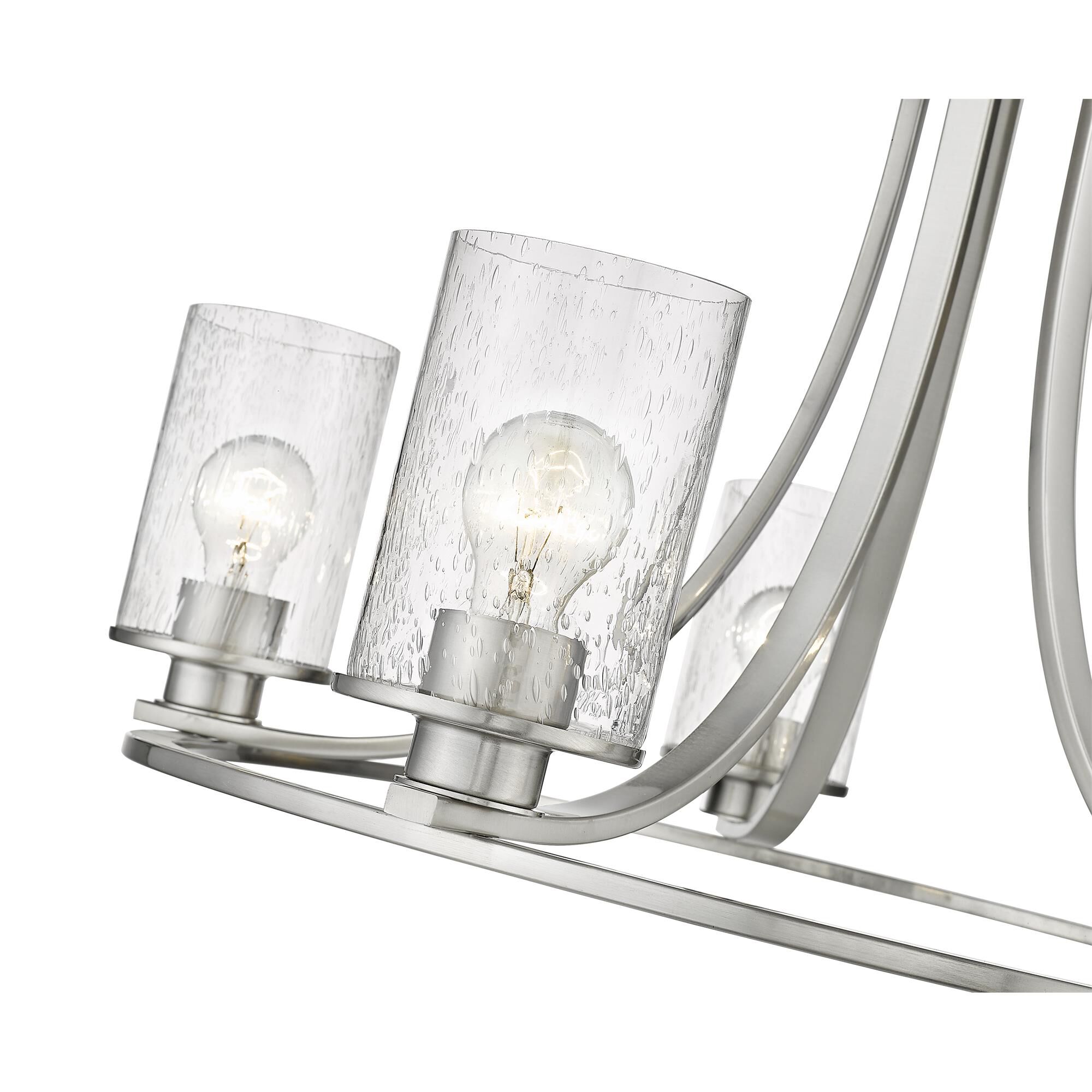 Shown in Brushed Nickel finish and Glass shade