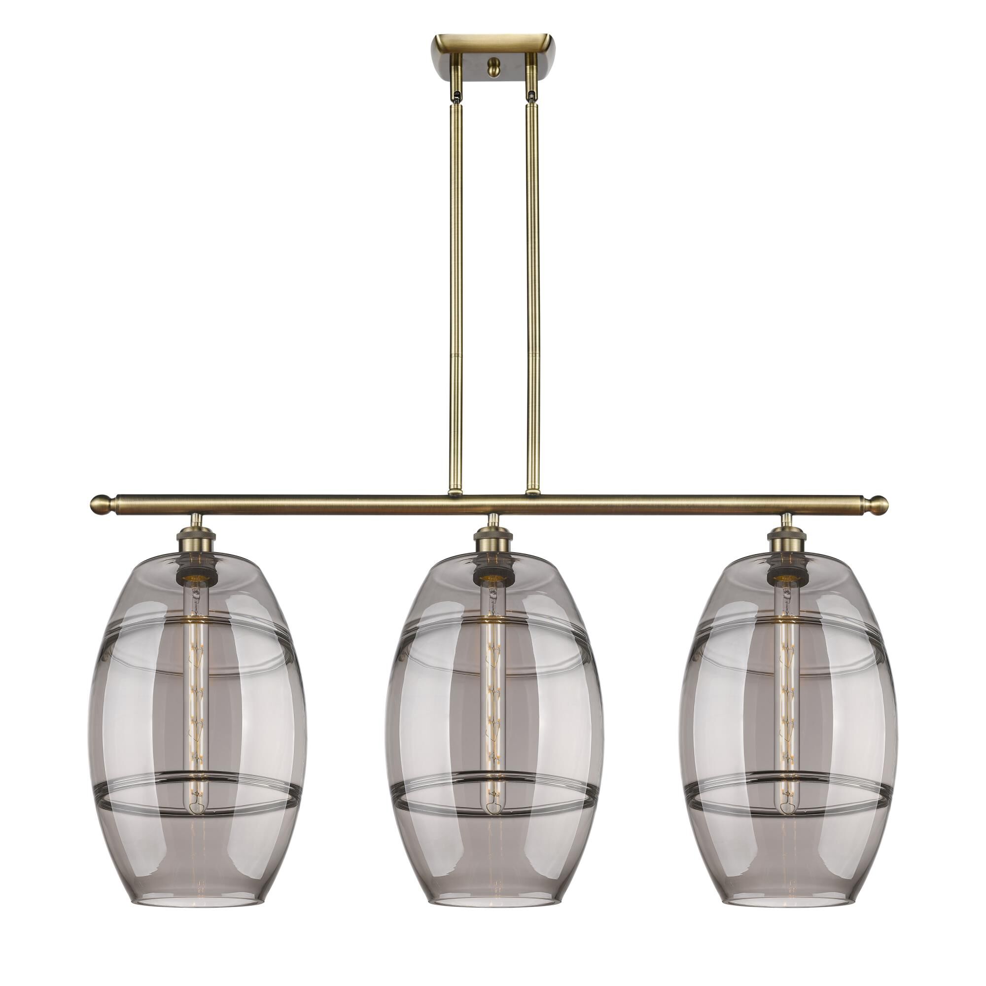Shown in Antique Brass finish and Light Smoke glass