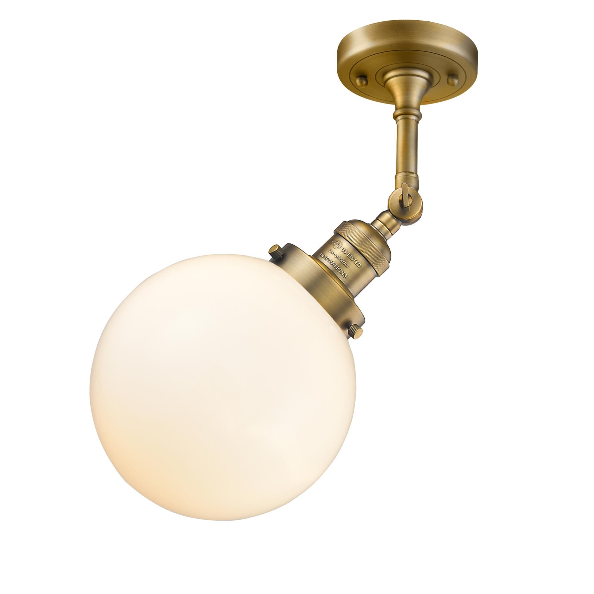 Shown in Brushed Brass finish and Matte White Cased glass and No Accent accent