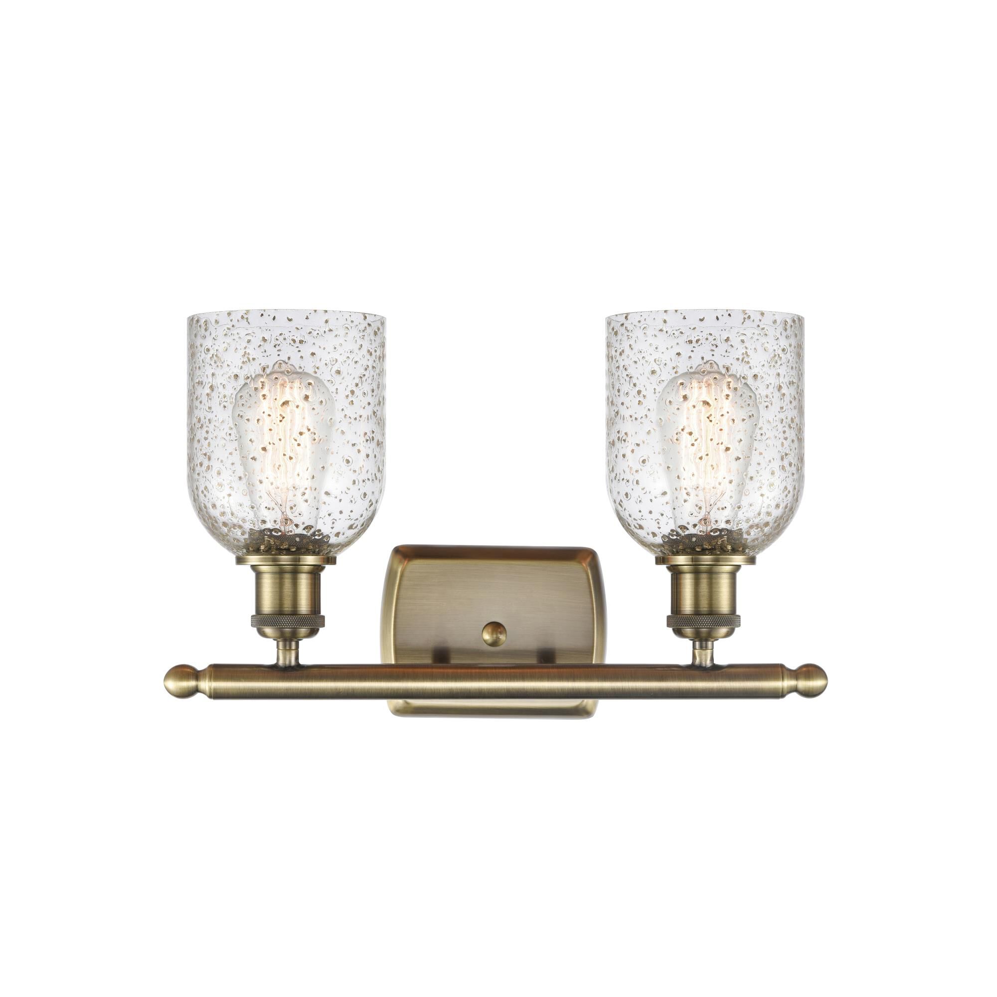 Shown in Antique Brass finish and Bell glass and Glass shade and Polished Chrome accent
