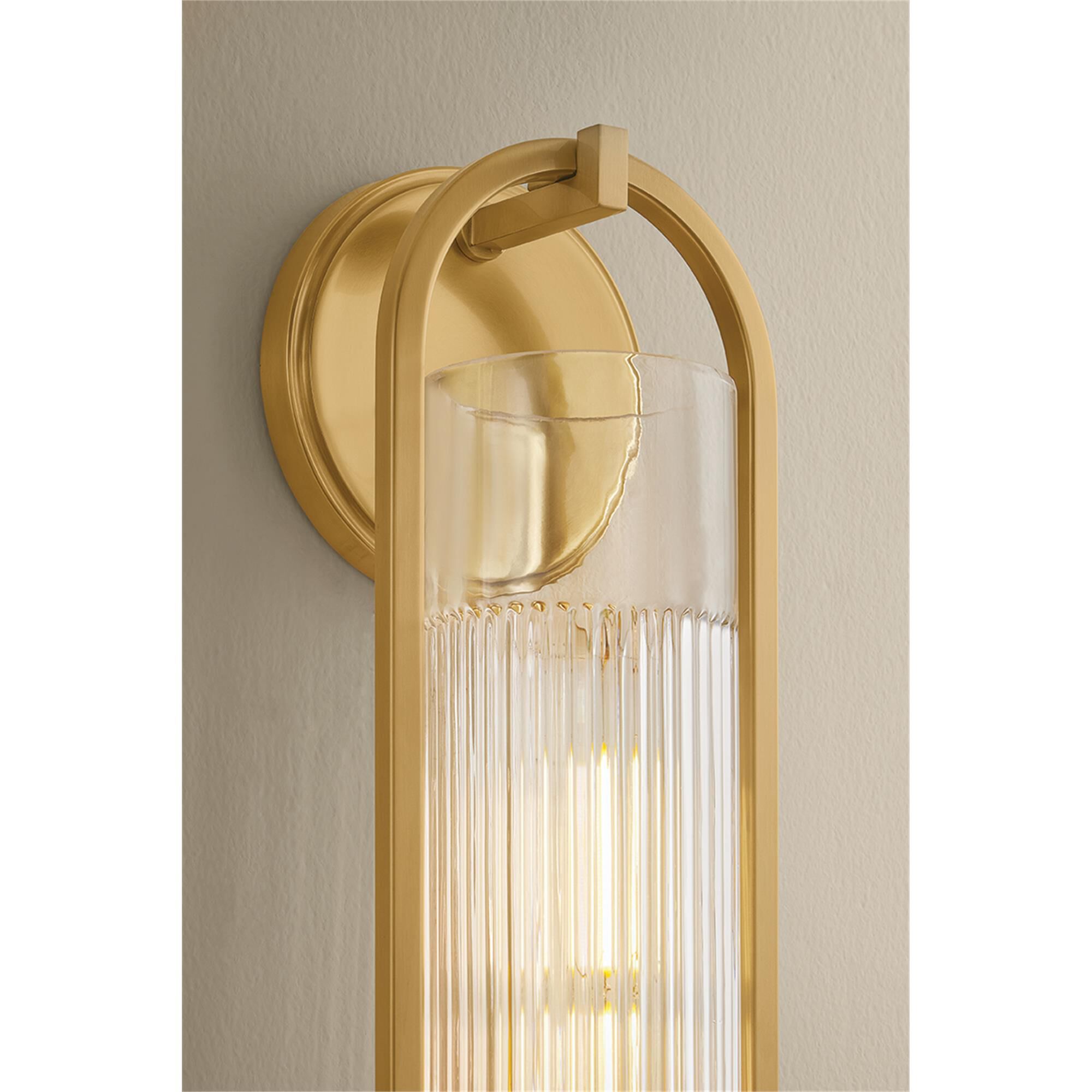 Shown in Aged Brass finish and Clear Optic glass