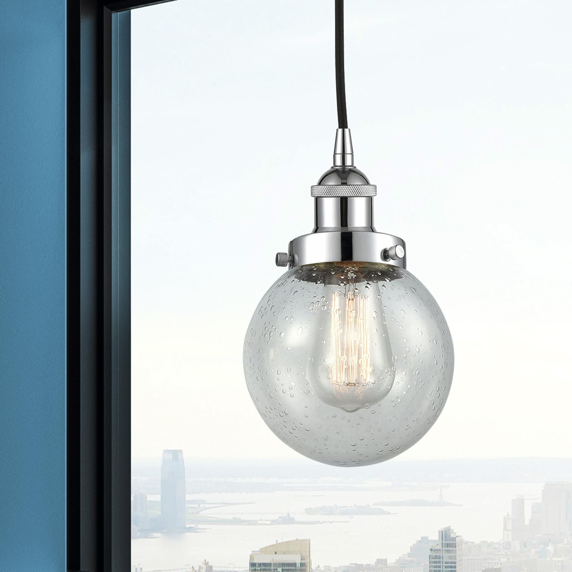 Shown in Polished Chrome finish and Seedy glass