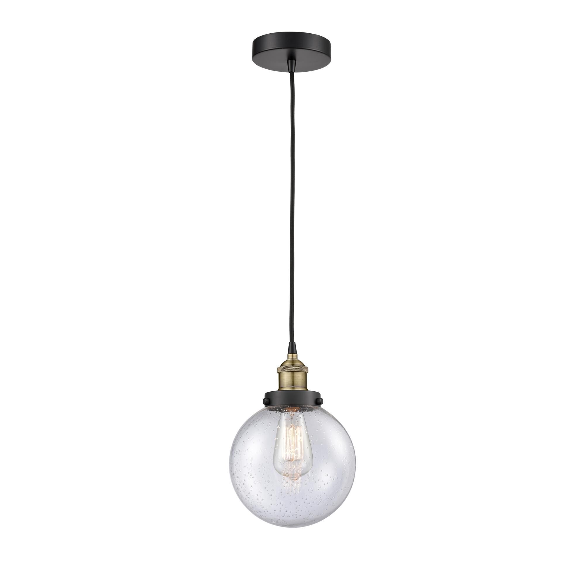 Shown in Black Antique Brass finish and Seedy glass