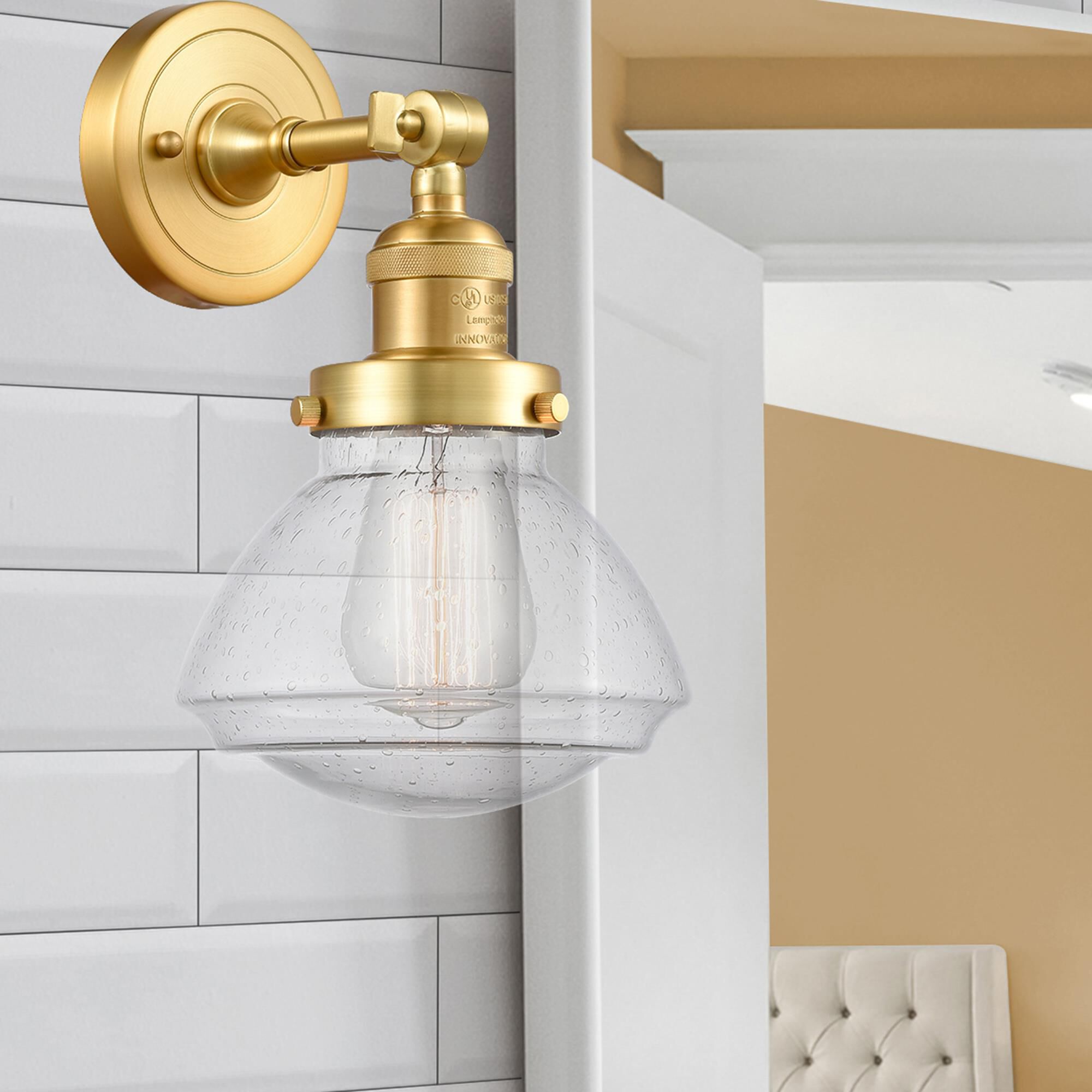 Shown in Satin Gold finish and Seedy Olean glass
