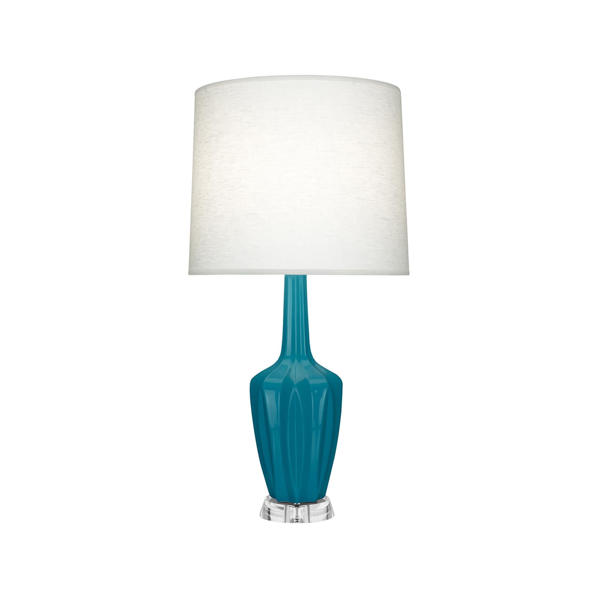 Shown in Peacock finish and Off White shade and Polished Nickel with Lucite accent