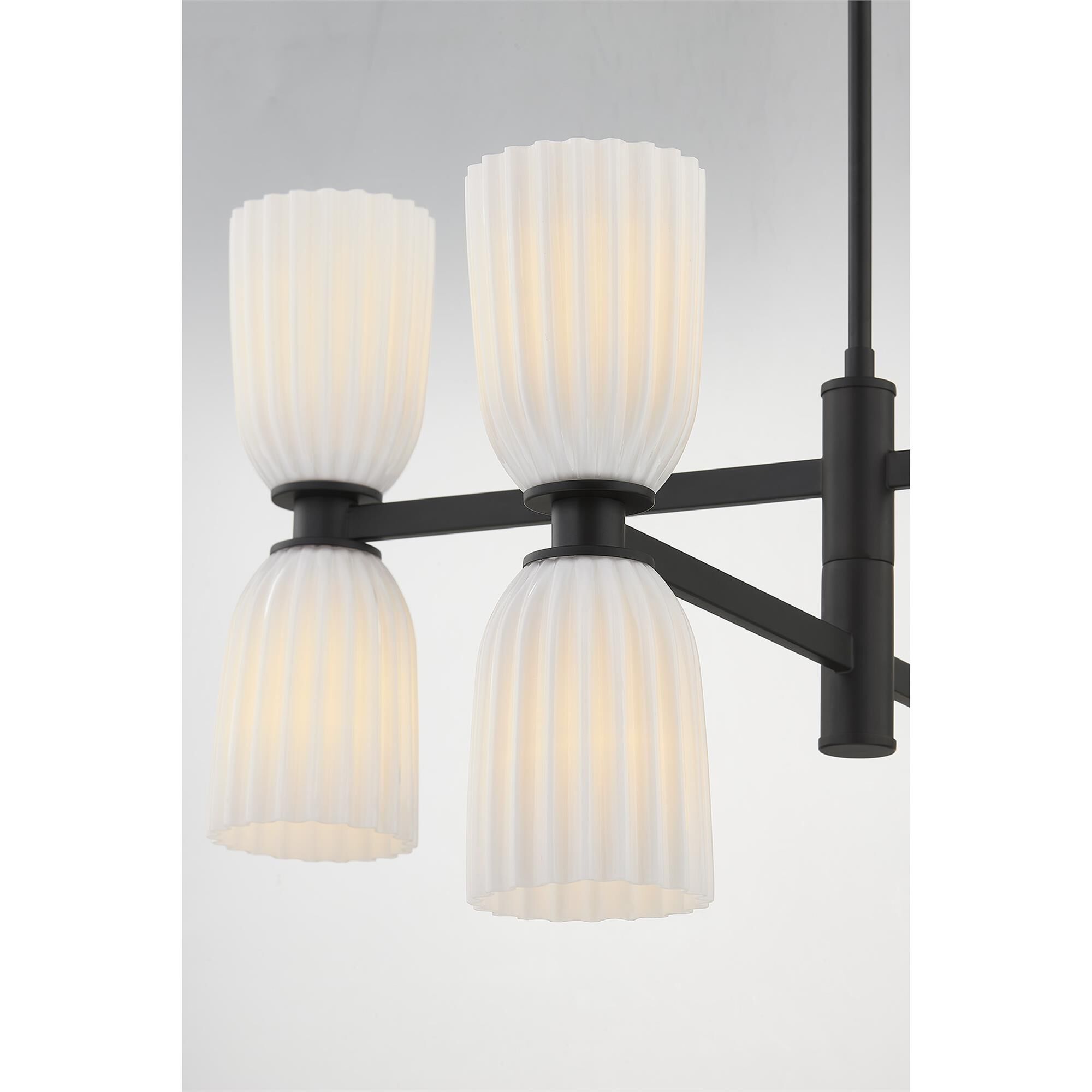 Shown in Matte Black finish and White Opal Ribbed glass