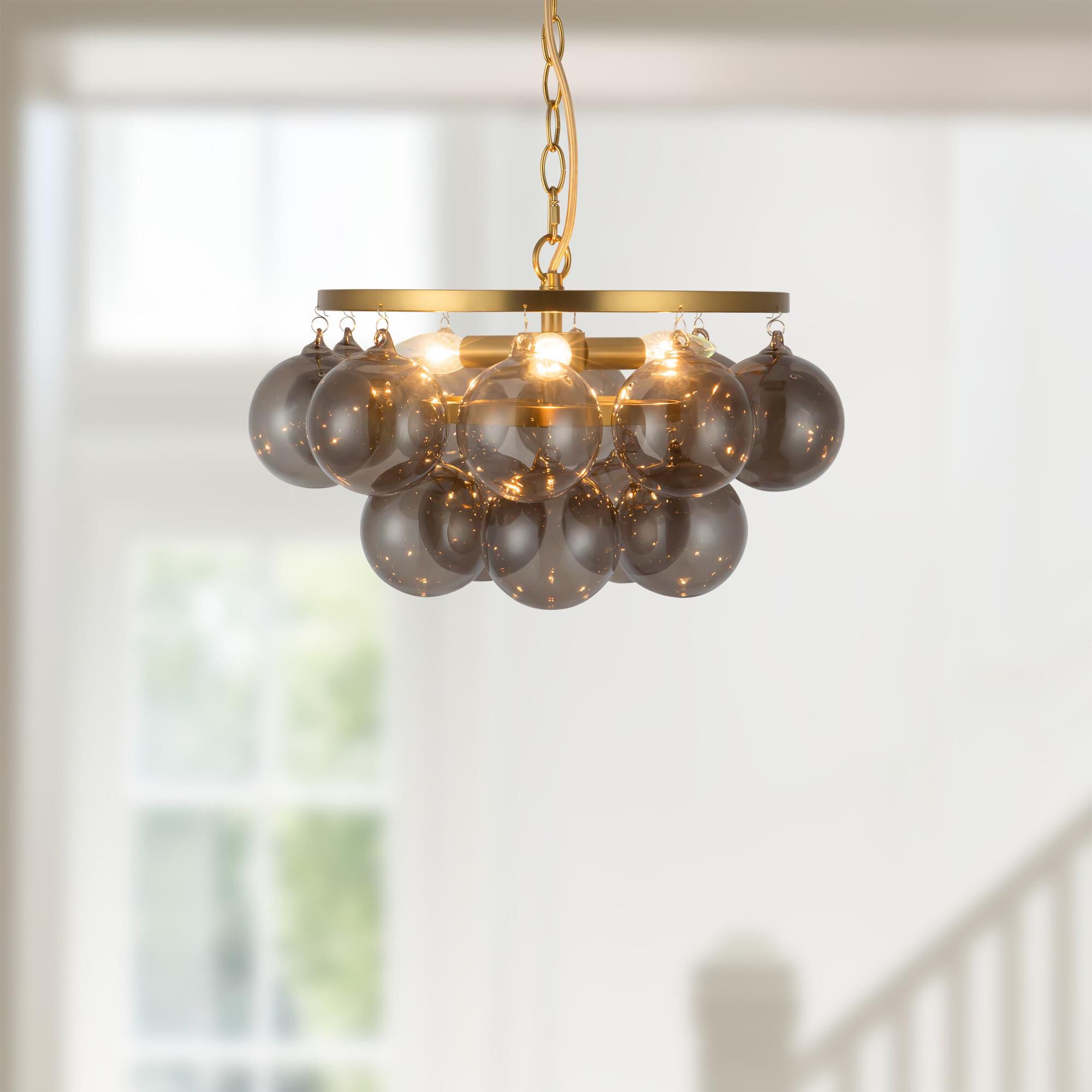 Shown in Brushed Gold finish and Smoked glass