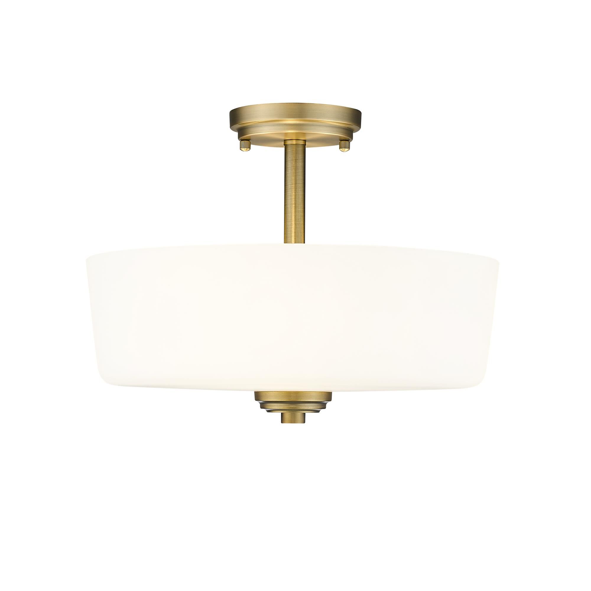 Shown in Heritage Brass finish and Glass shade